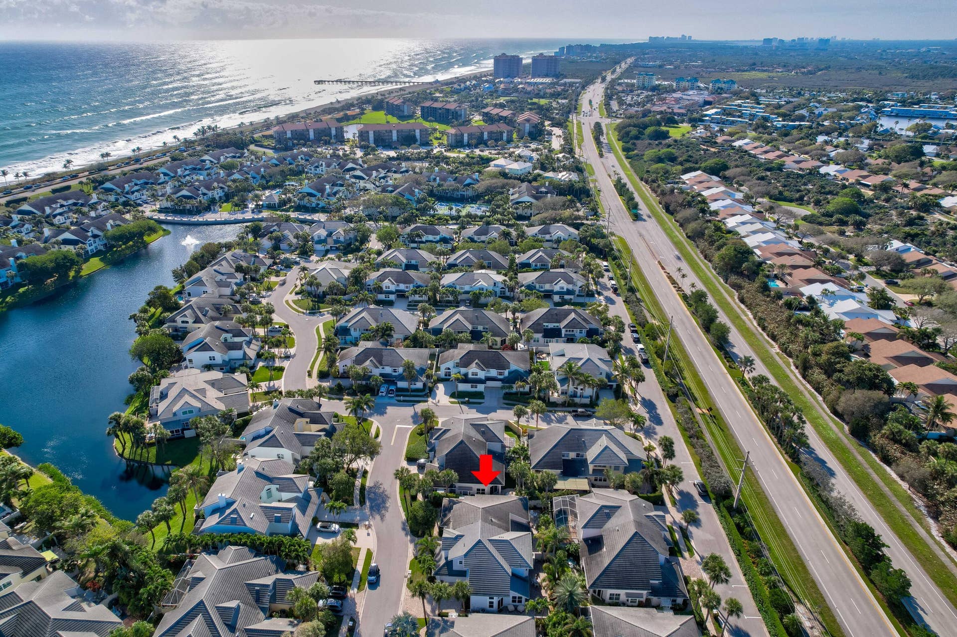 2043 Staysail Lane, Jupiter, Jupiter, FL 33477 Coastal community with waterfront access and direct proximity to a multi-lane thoroughfare