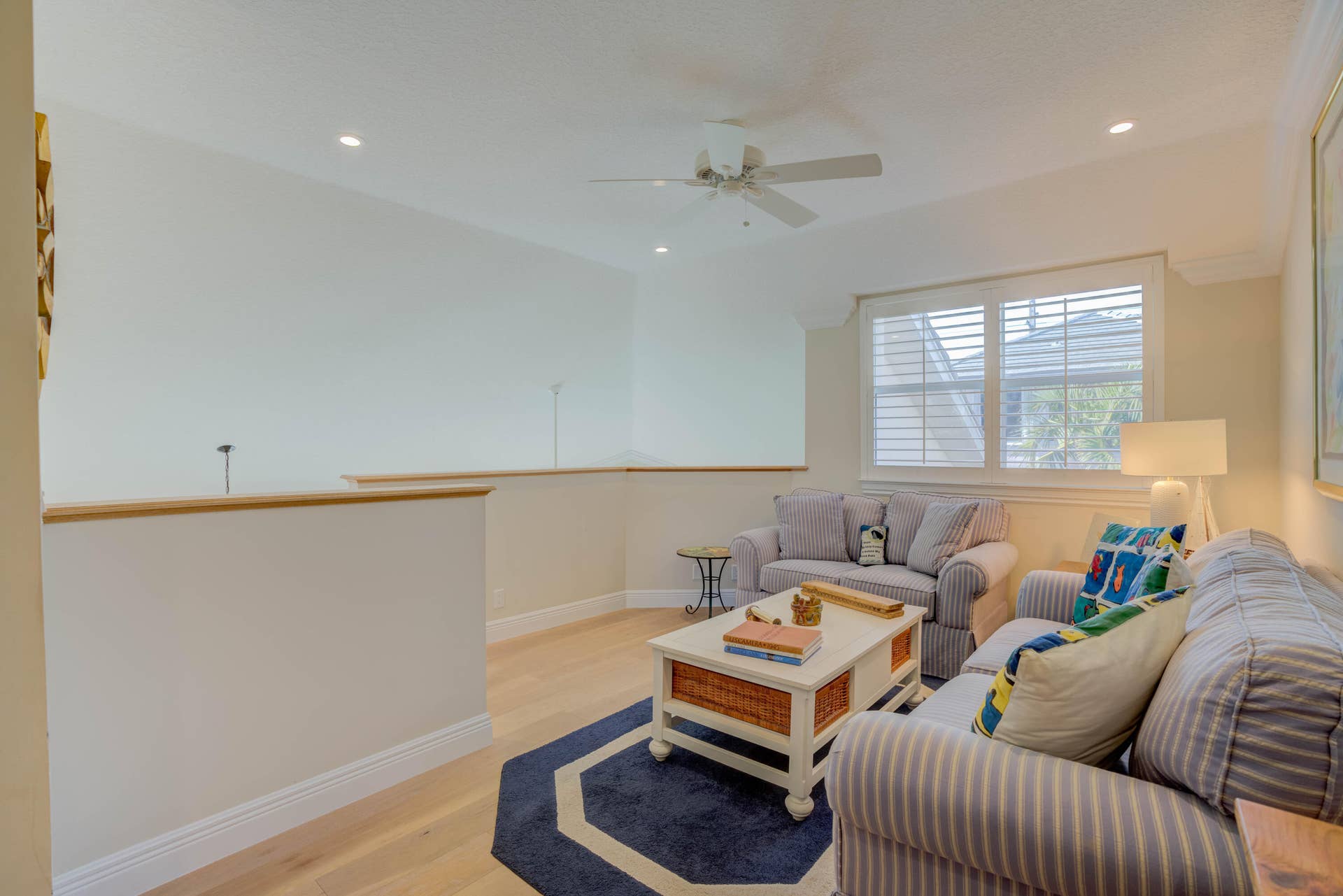 2043 Staysail Lane, Jupiter, Jupiter, FL 33477 Loft space featuring wood-finish flooring, recessed lighting, and a ceiling fan