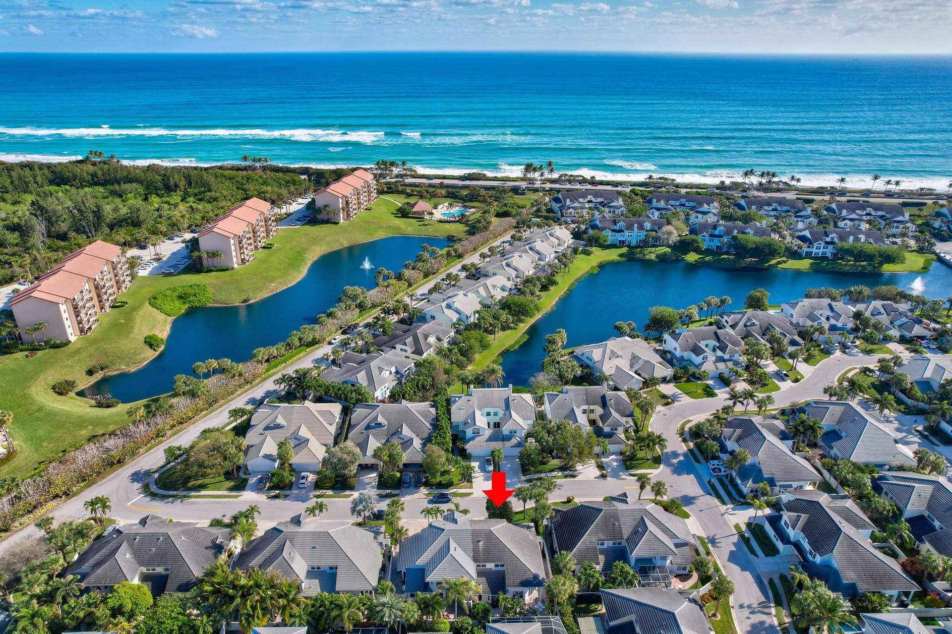 2043 Staysail Lane, Jupiter, Jupiter, FL 33477 Coastal community featuring residential properties, multiple water features, and manicured landscaping