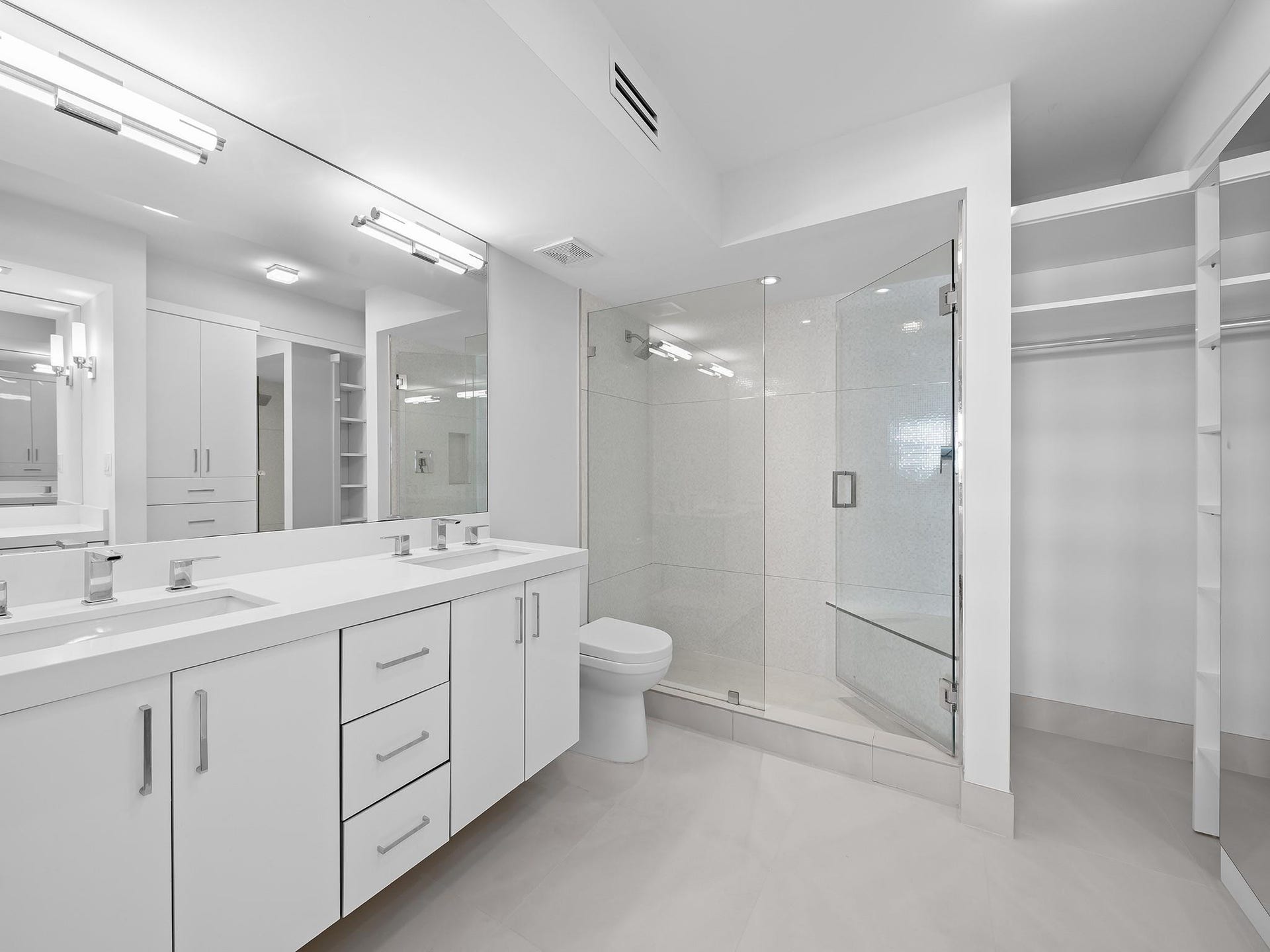 2000 S Ocean Drive, #709, Fort Lauderdale, FL 33316 A spacious bathroom unfolds like a serene retreat.