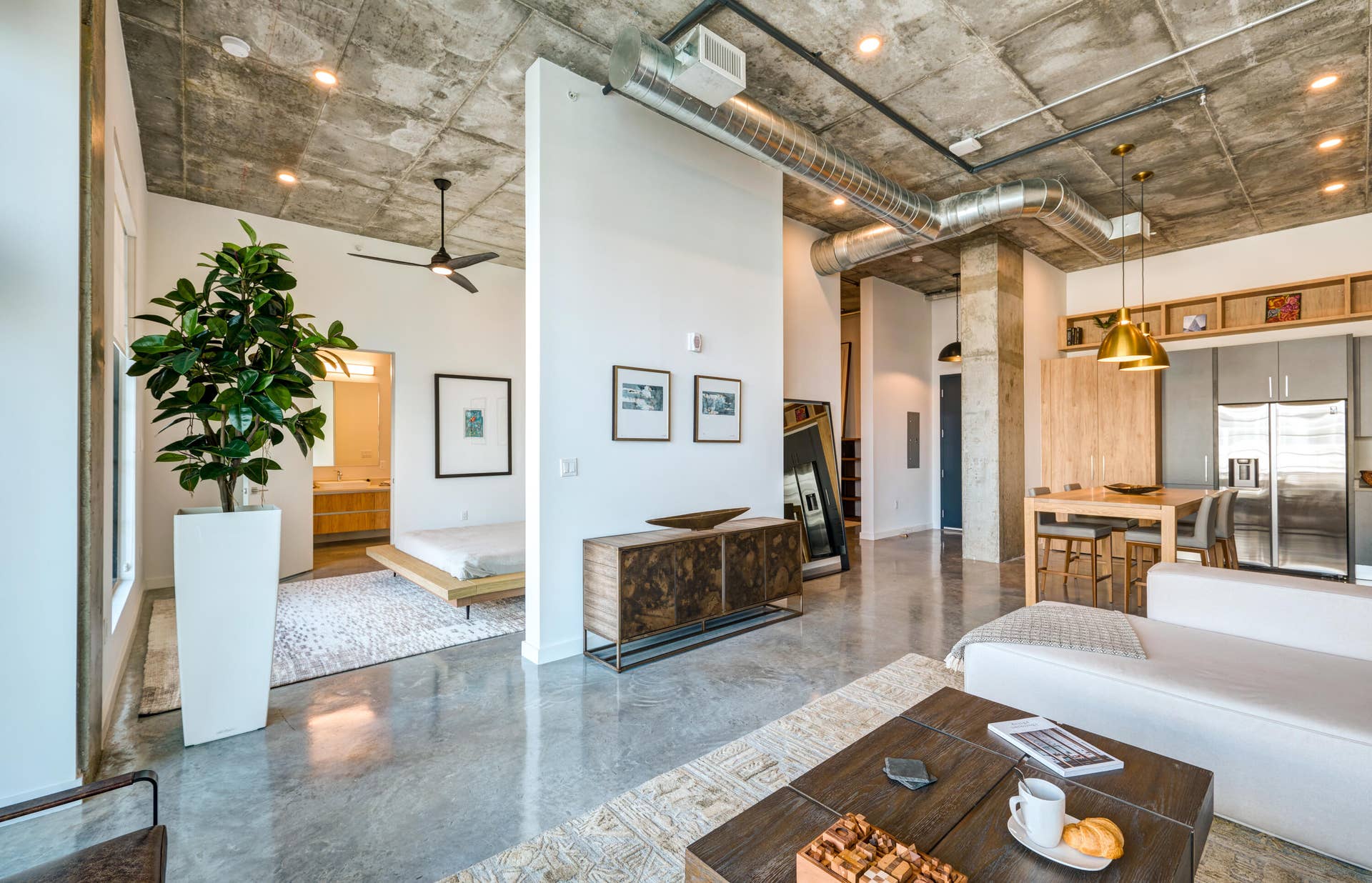 Living room - looking into bedroom and k