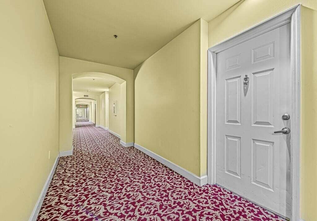 616 Clearwater Park Road, West Palm Beach, FL 33401 1112 Hallway leading up to unit