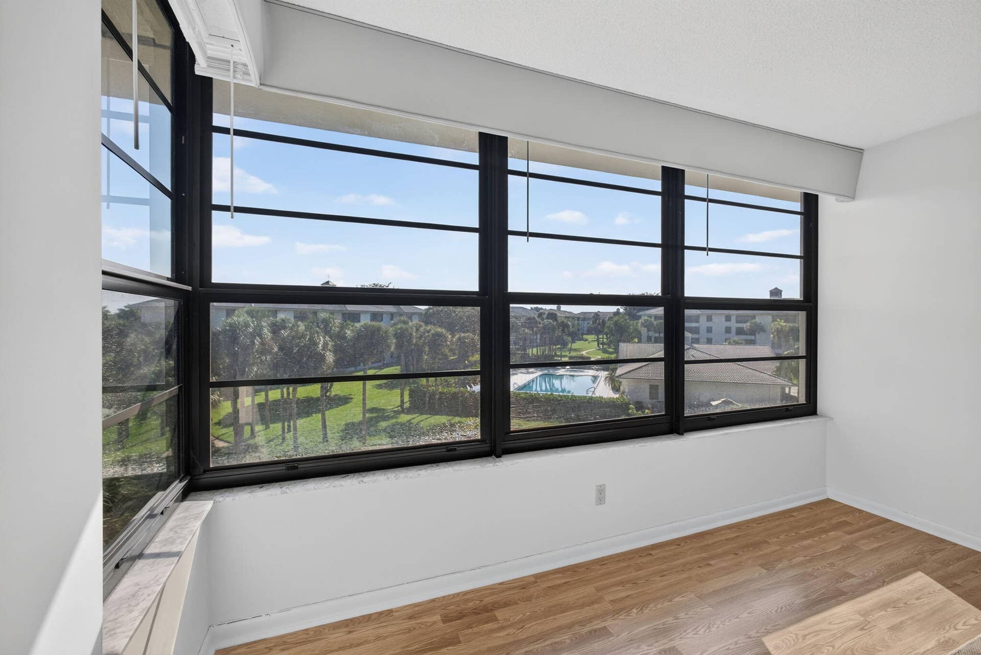 3710 WHITEHALL Drive, #401, West Palm Beach, FL 33401 View to community pool
