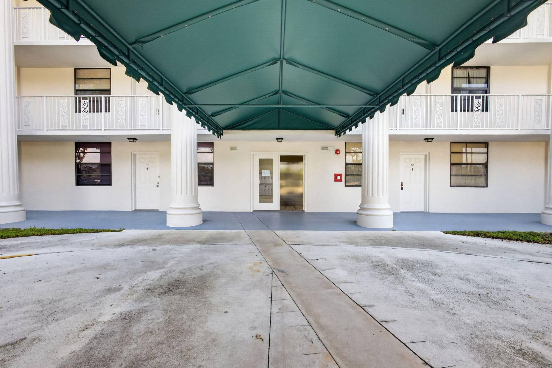 3710 WHITEHALL Drive, #401, West Palm Beach, FL 33401 Awning over entrance