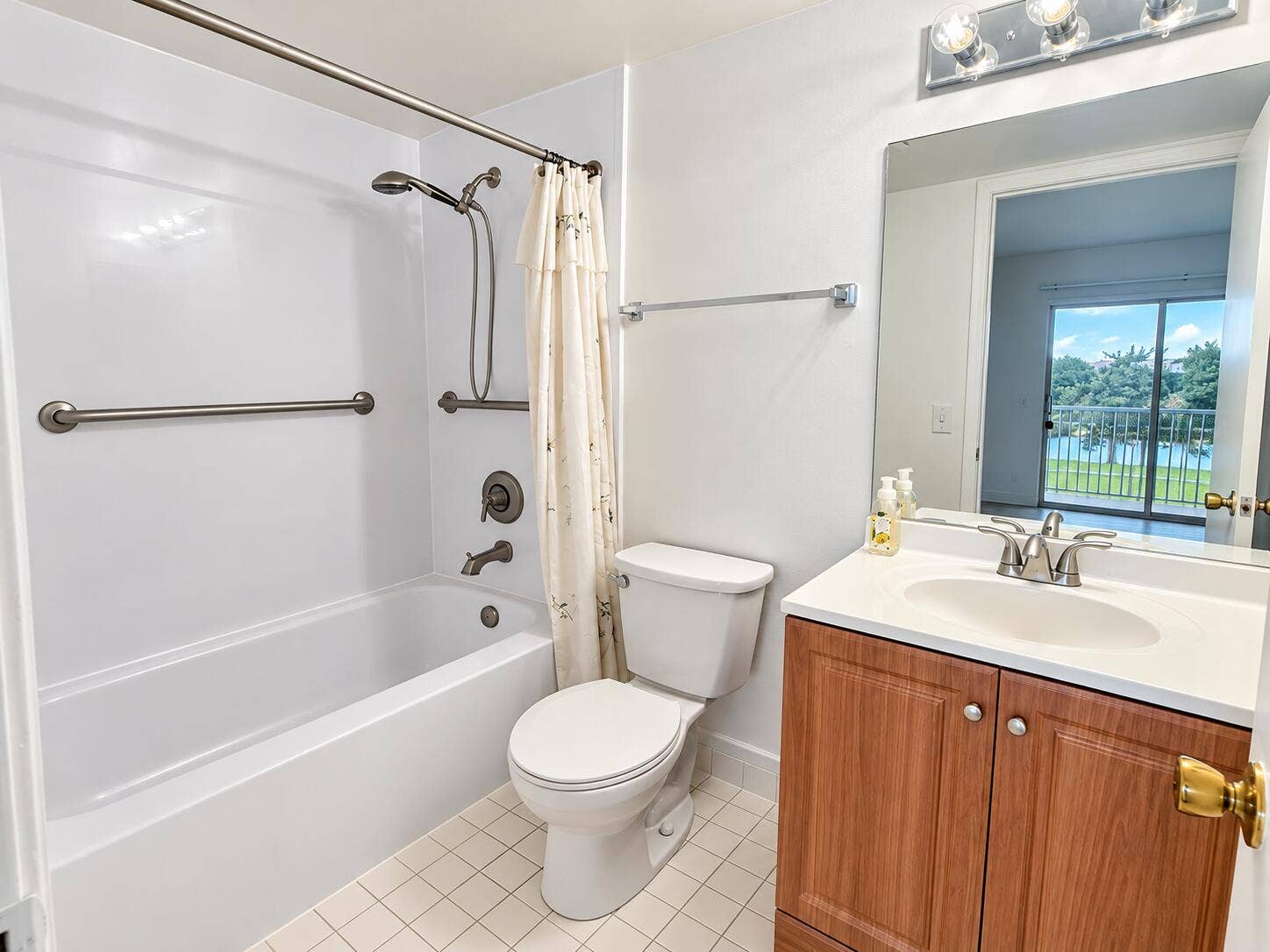 Bright Modern Bathroom with Balcony View