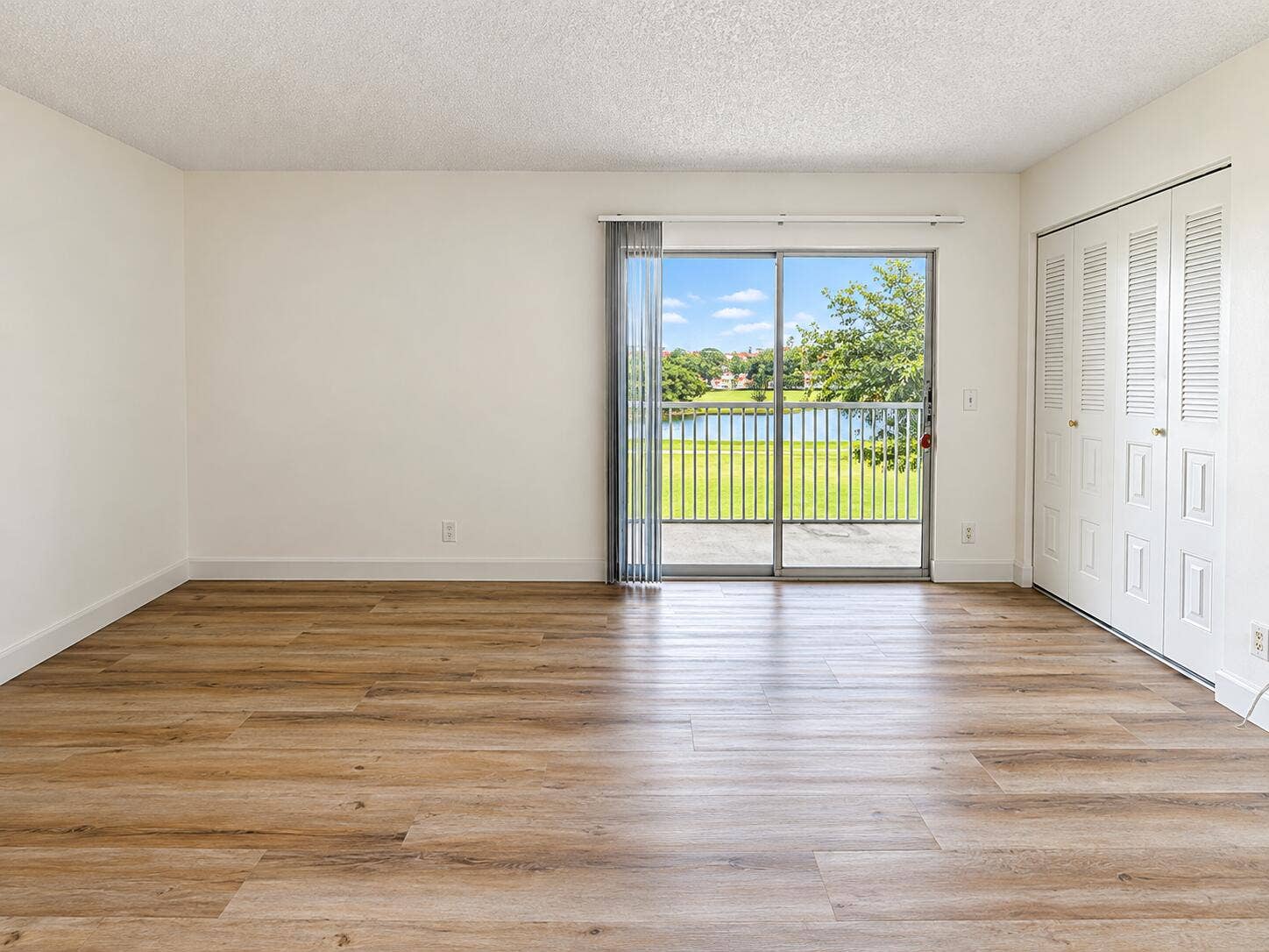 Bright Minimalist Room with Balcony View