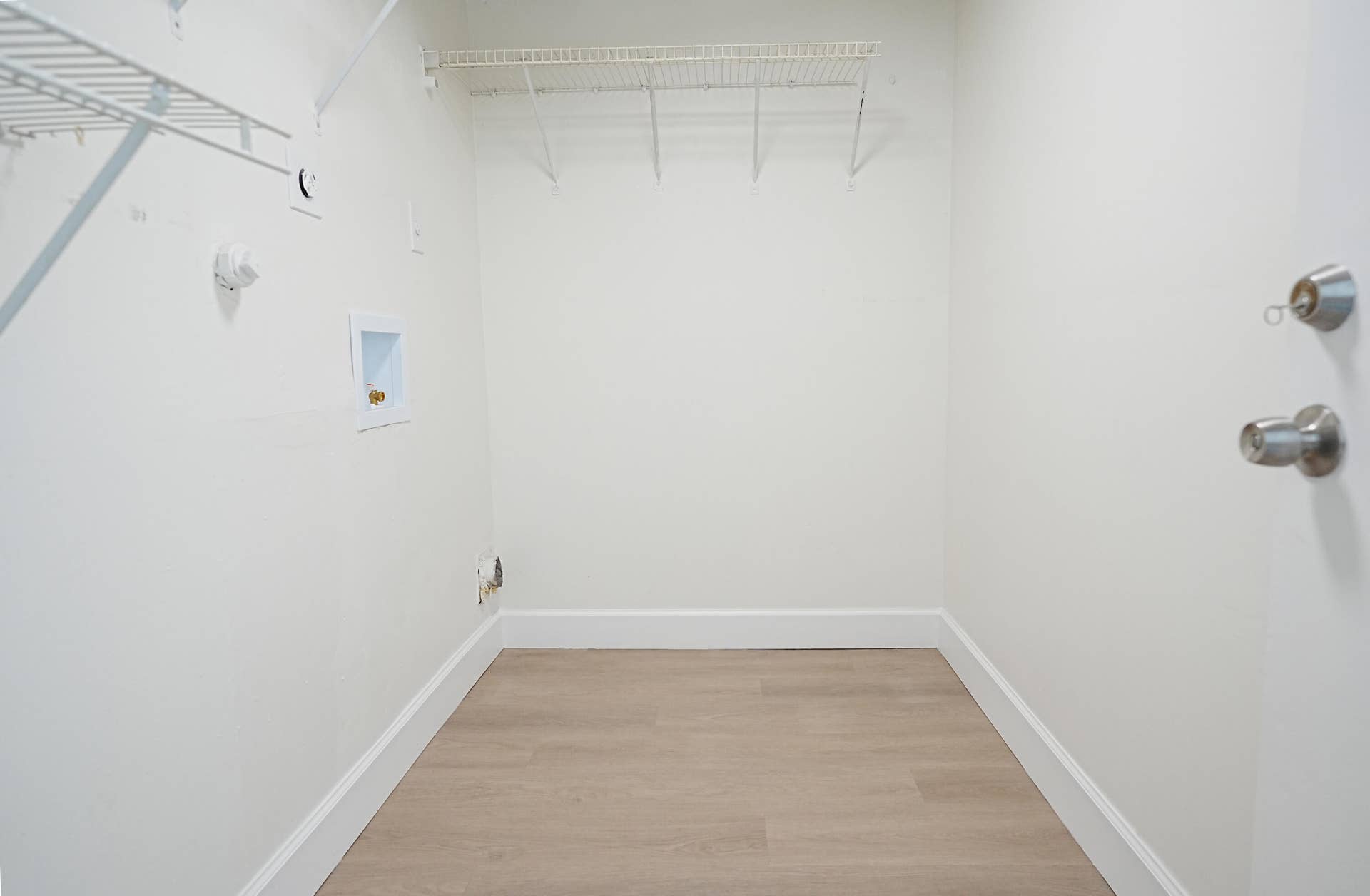 Large room in garage, enough space for full size washer and dryer and additional storage.