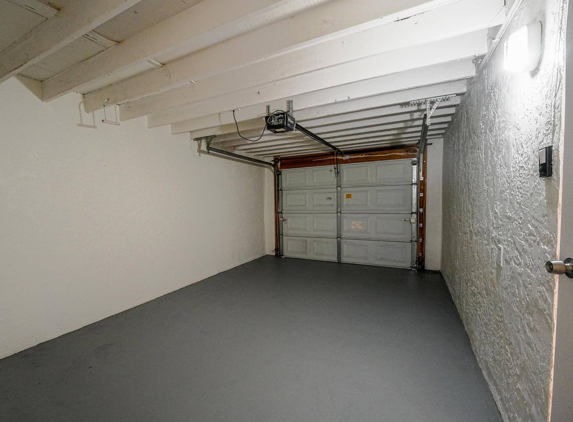 1-car garage with electric garage door opener