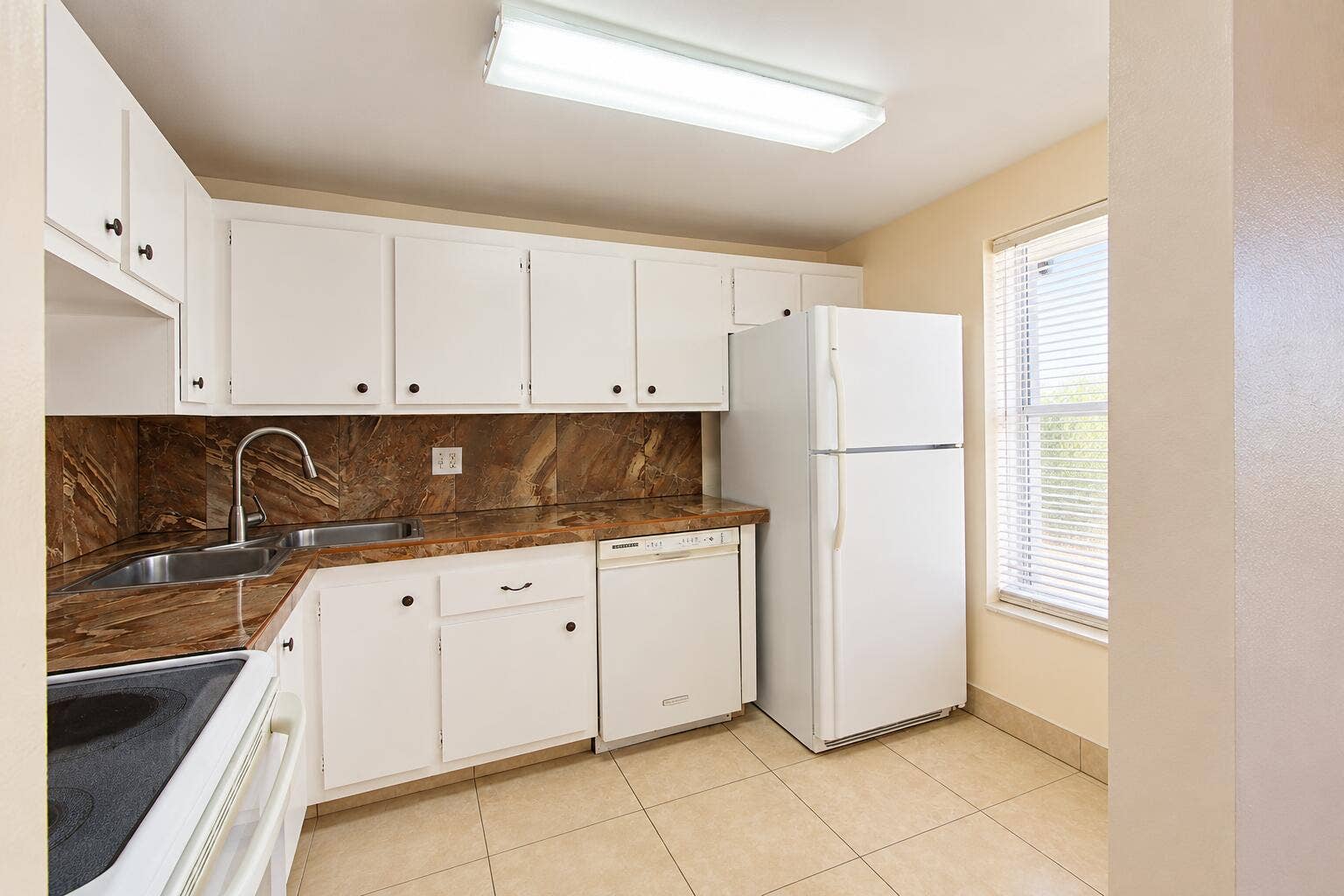 Bright Neutral L-Shaped Kitchen