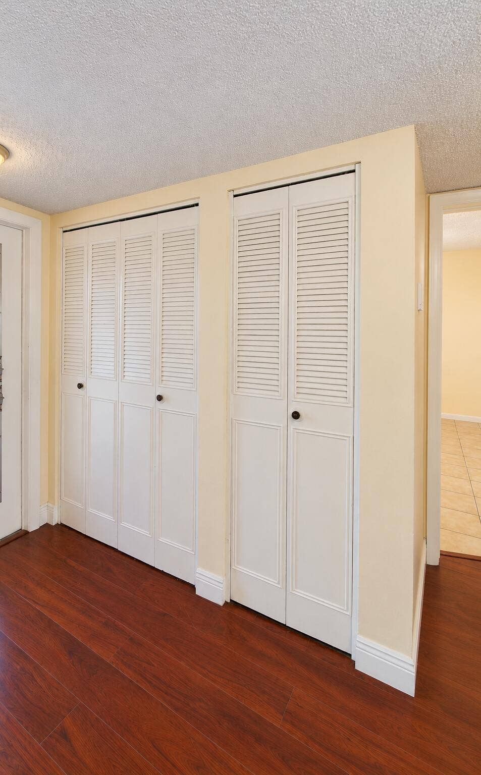 Bright Entry Hallway with Louvered Close