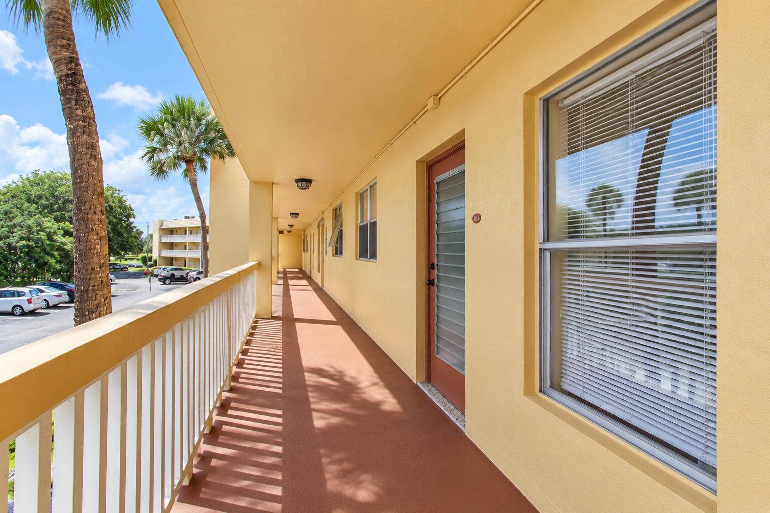 Sunny Tropical Apartment Corridor