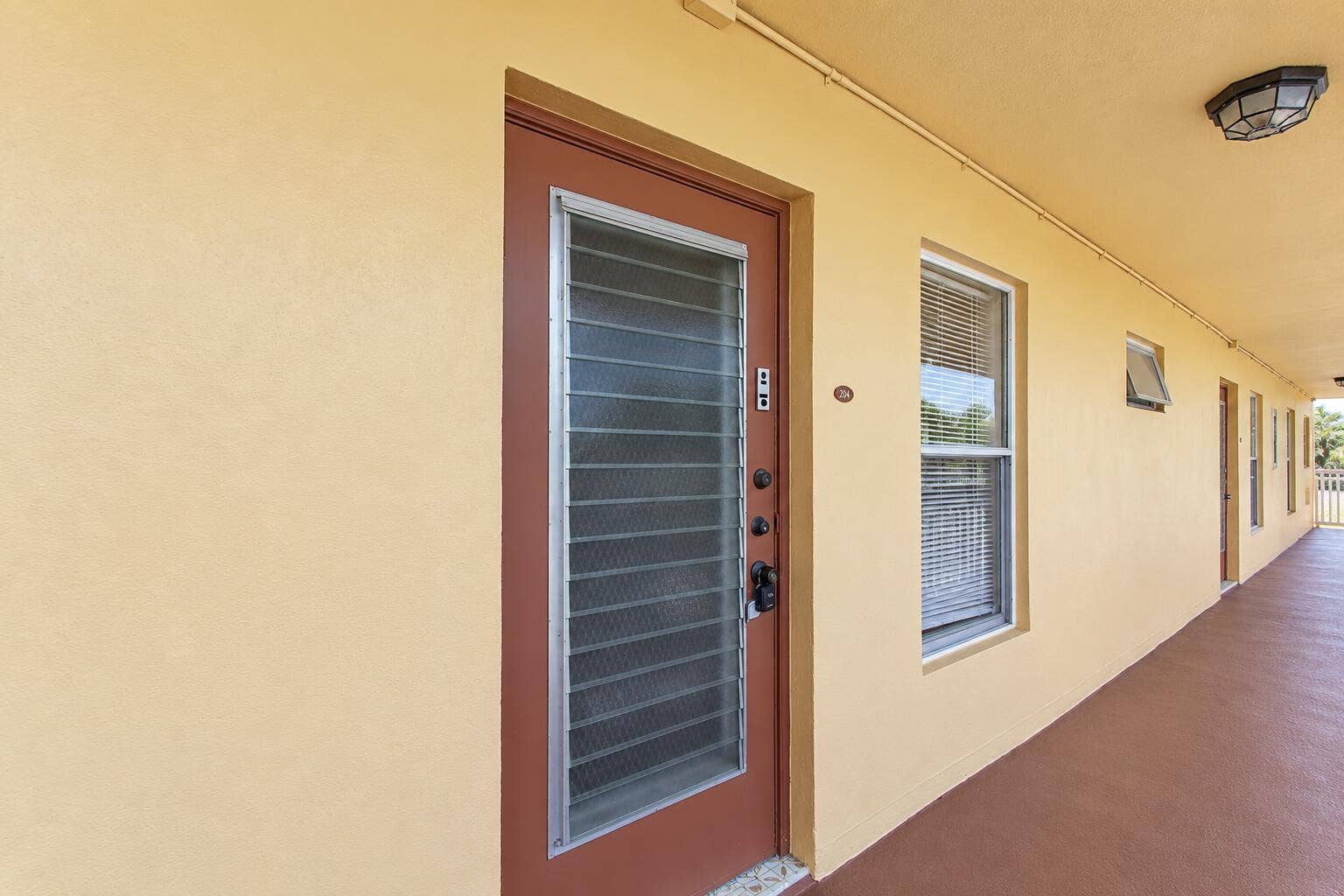 Apartment Corridor with Unit 204 Door
