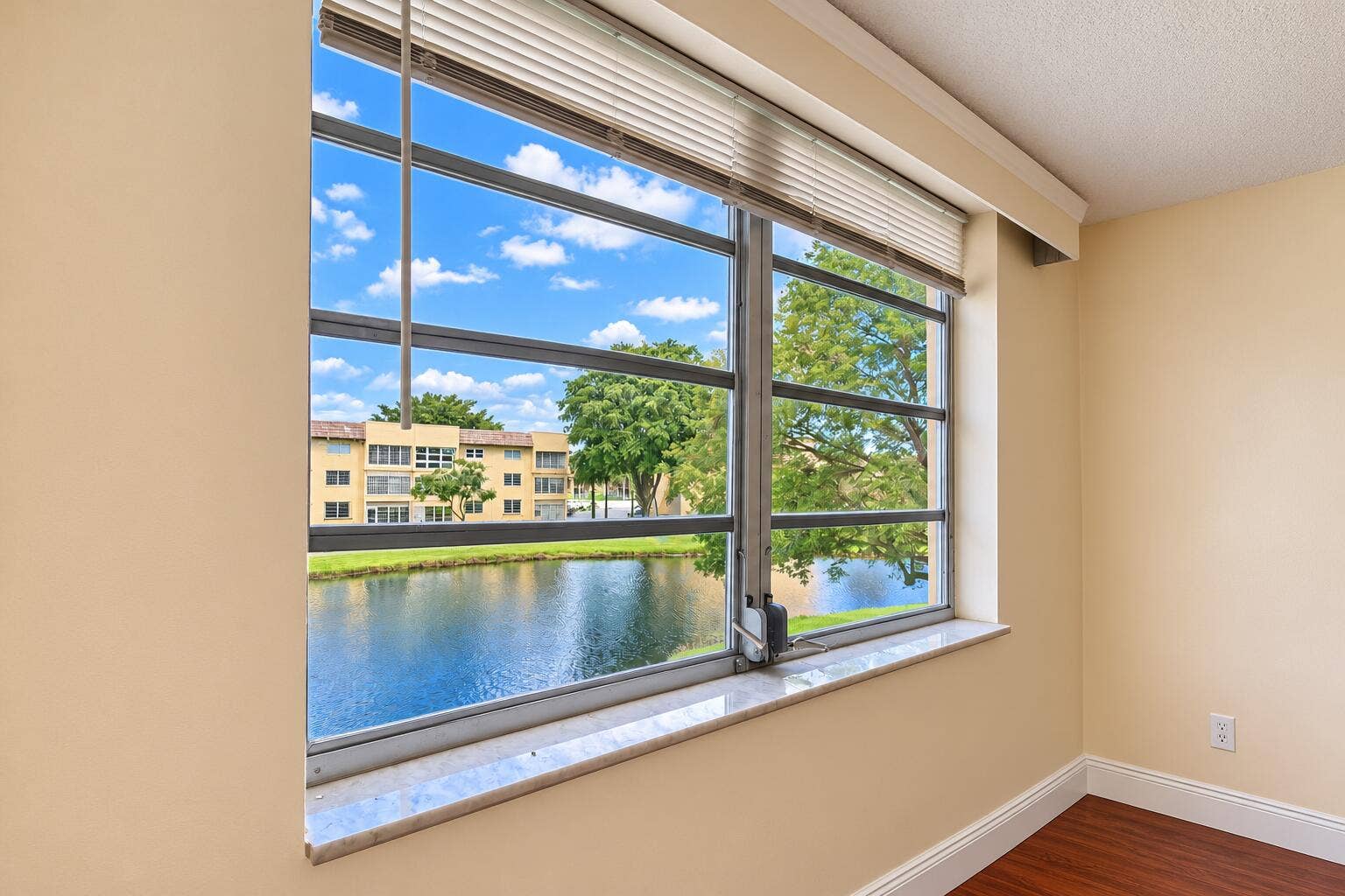 Bright Room with Lakeside Window View