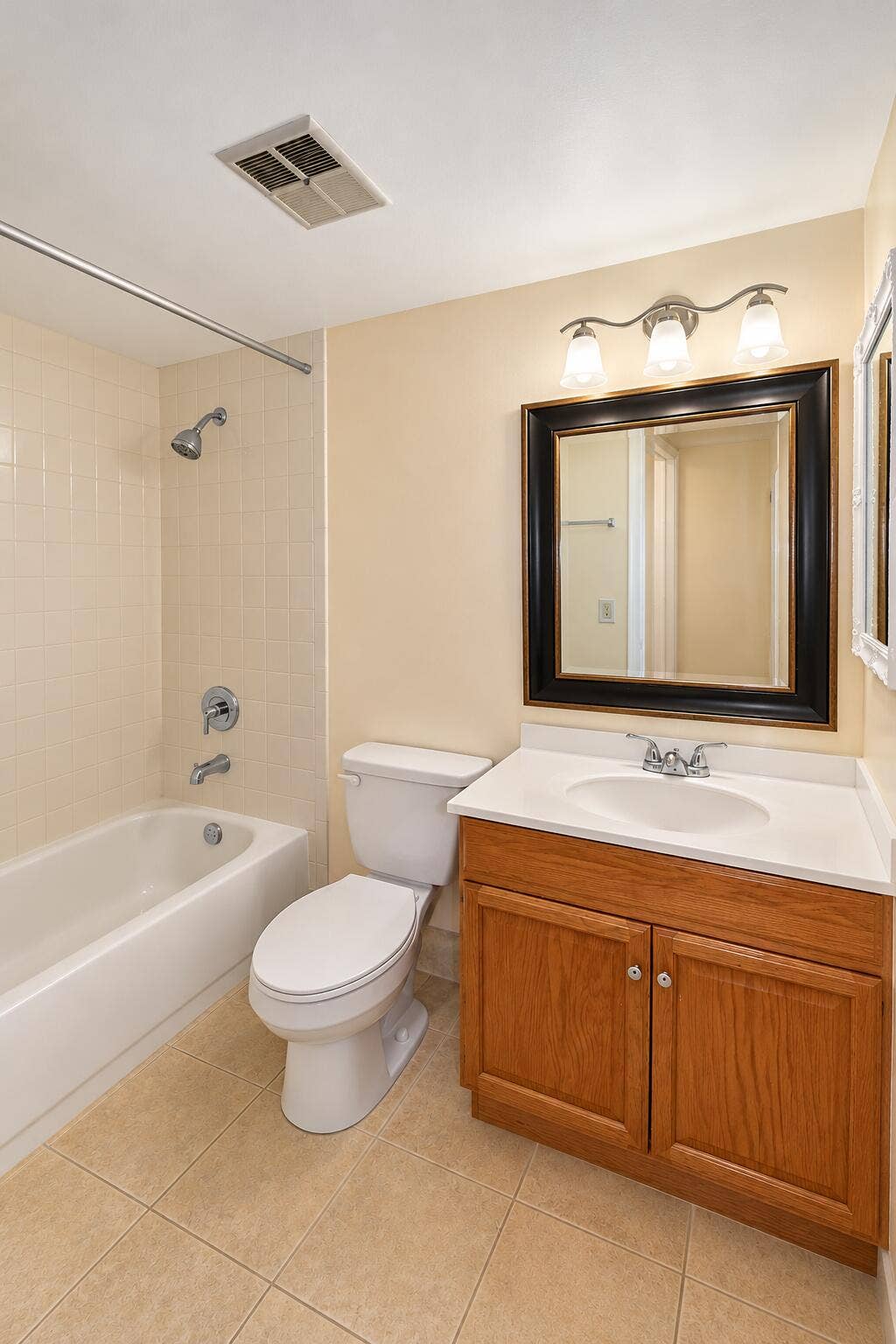 Bright Neutral Bathroom with Oak Vanity