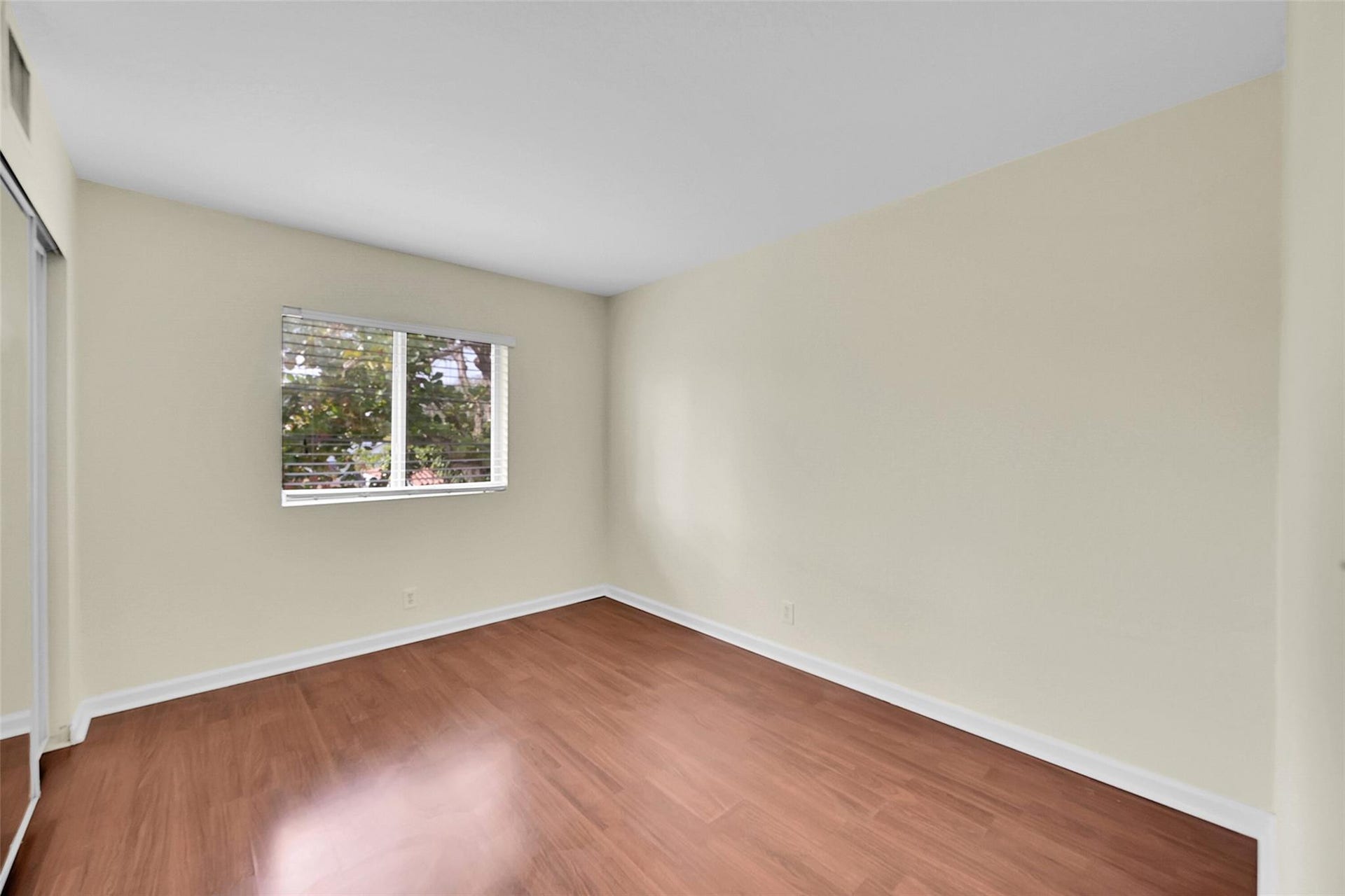 2655 NE 8th Avenue, #Apt 210, Wilton Manors, FL 33334 Wood-finish flooring with white trim