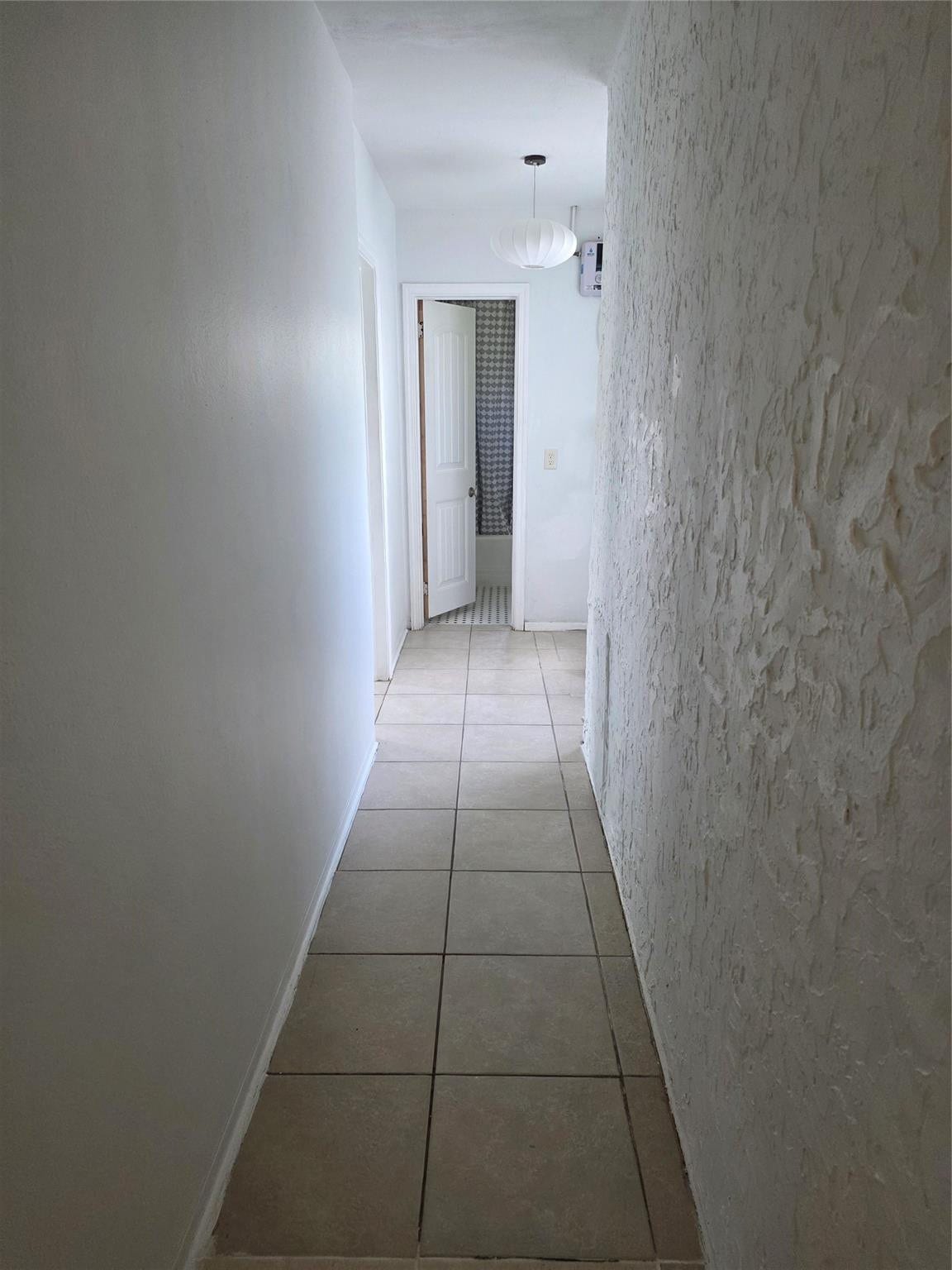 Hallway to bedrooms and bathroom