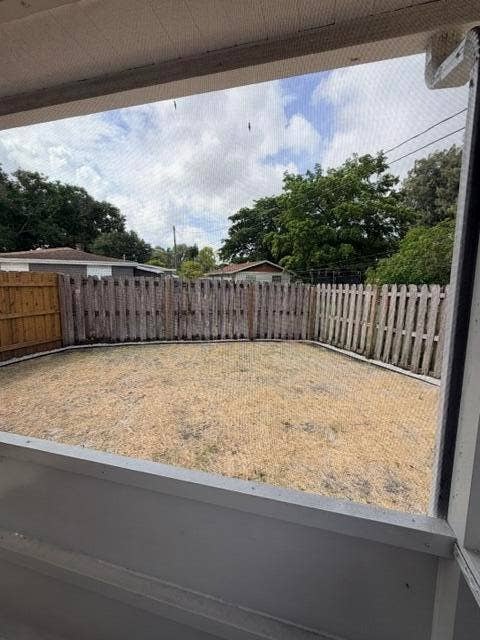 patio and fenced yard
