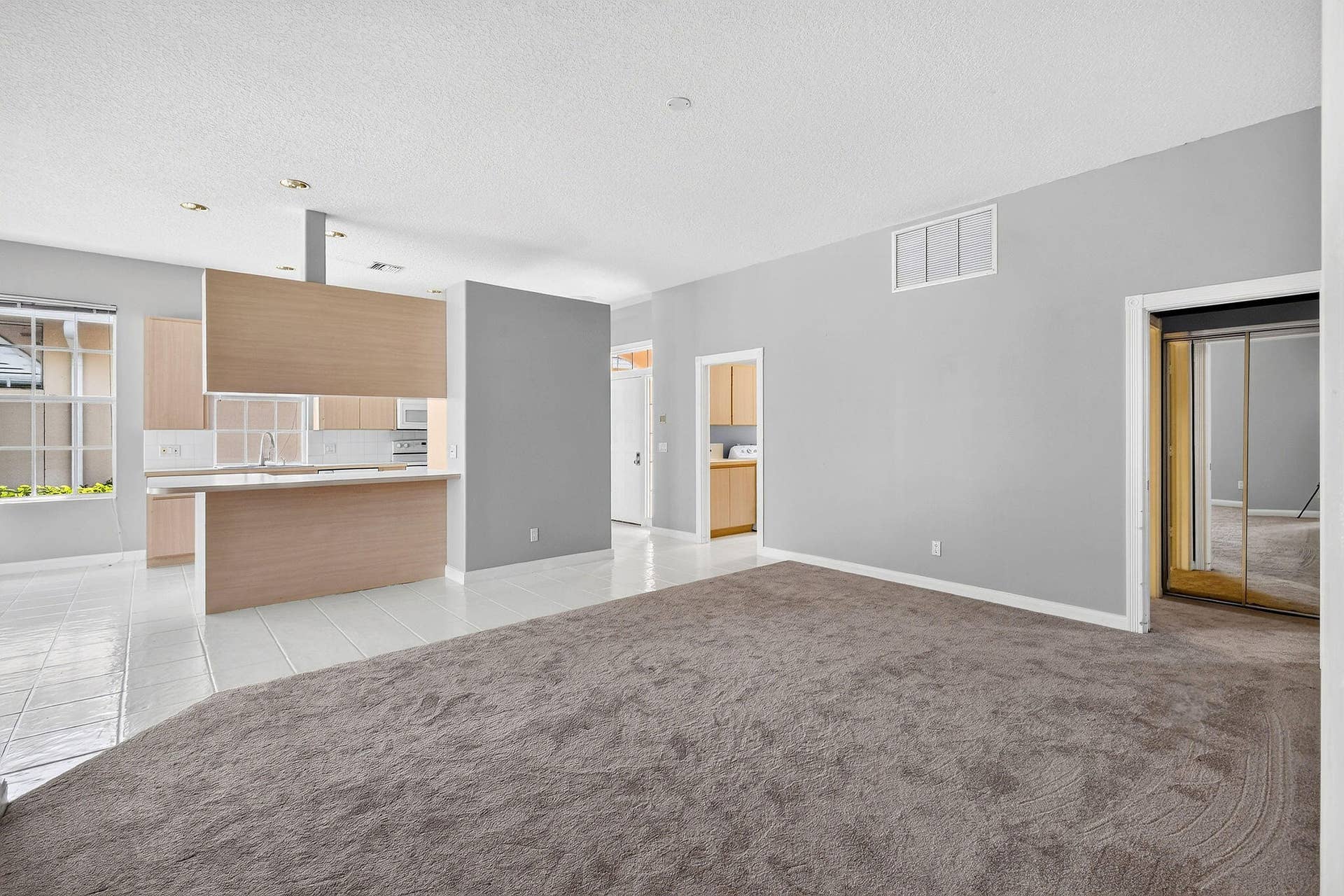 1081 Bedford Avenue, Palm Beach Gardens, FL 33403 From LivRm toward kitchen, foyer &BR 2