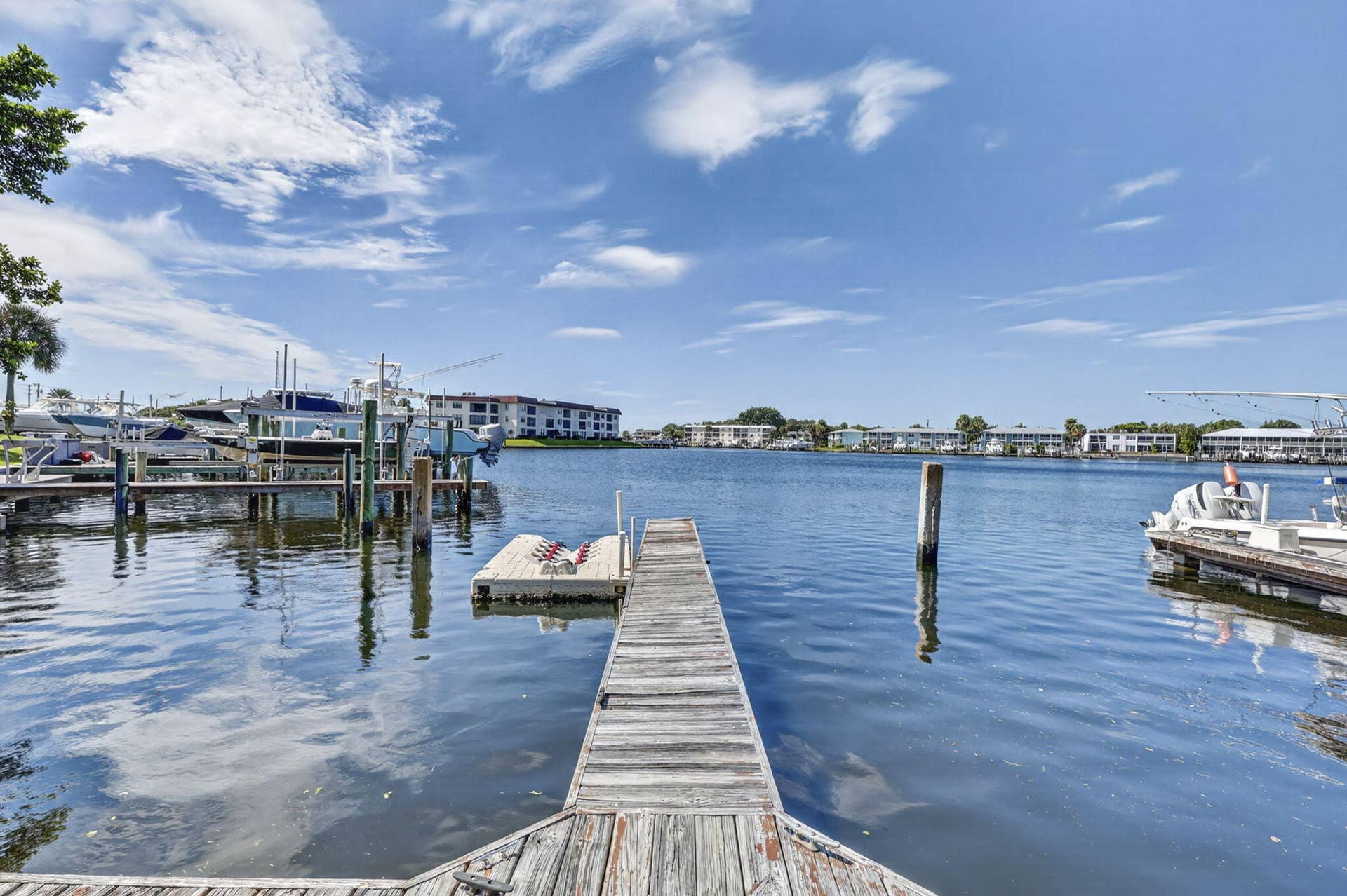 405 SOUTHWIND Drive, #3, North Palm Beach, FL 33408 Private wooden dock extending into the waterway