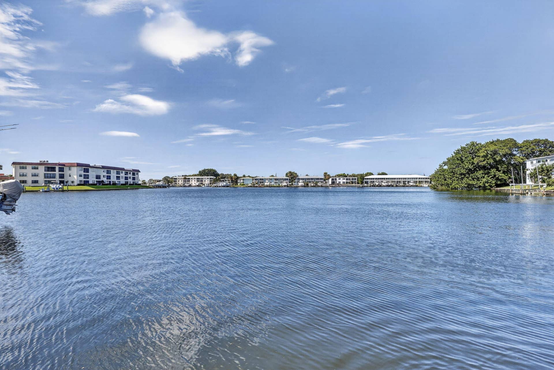 405 SOUTHWIND Drive, #3, North Palm Beach, FL 33408 Waterfront setting with direct access to canal and mature coastal vegetation