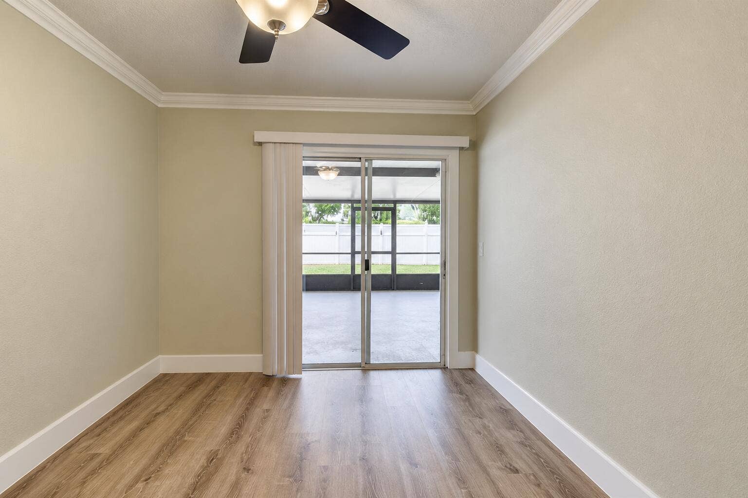 8379 Garden Gate Place, Boca Raton, FL 33433 Empty Modern Room with Patio View