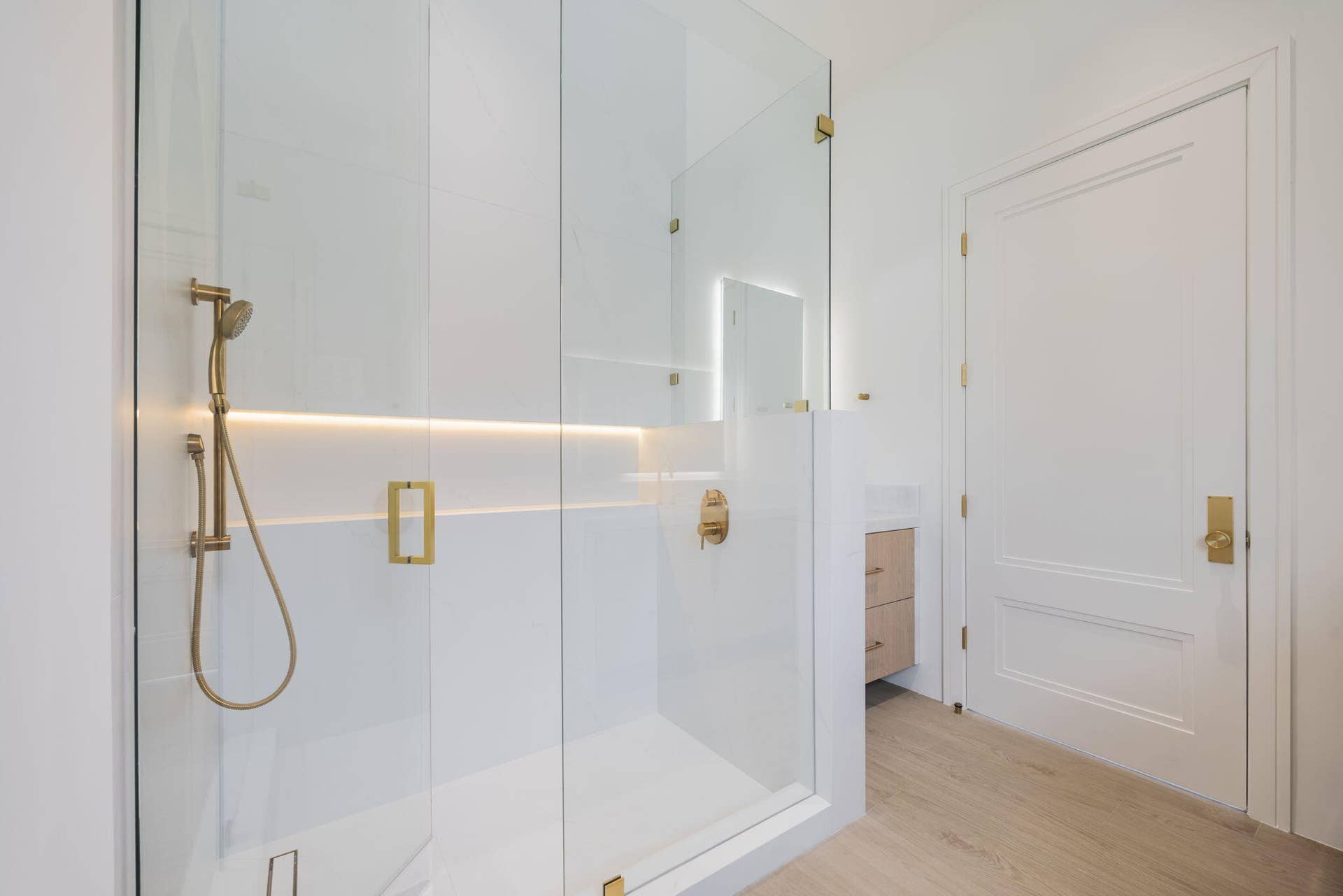 2921 NE 23RD Street, Pompano Beach, FL 33062 Bathroom 2 shower w/ 2 vanities and smart toilet and backlit led mirrors - 2nd floor