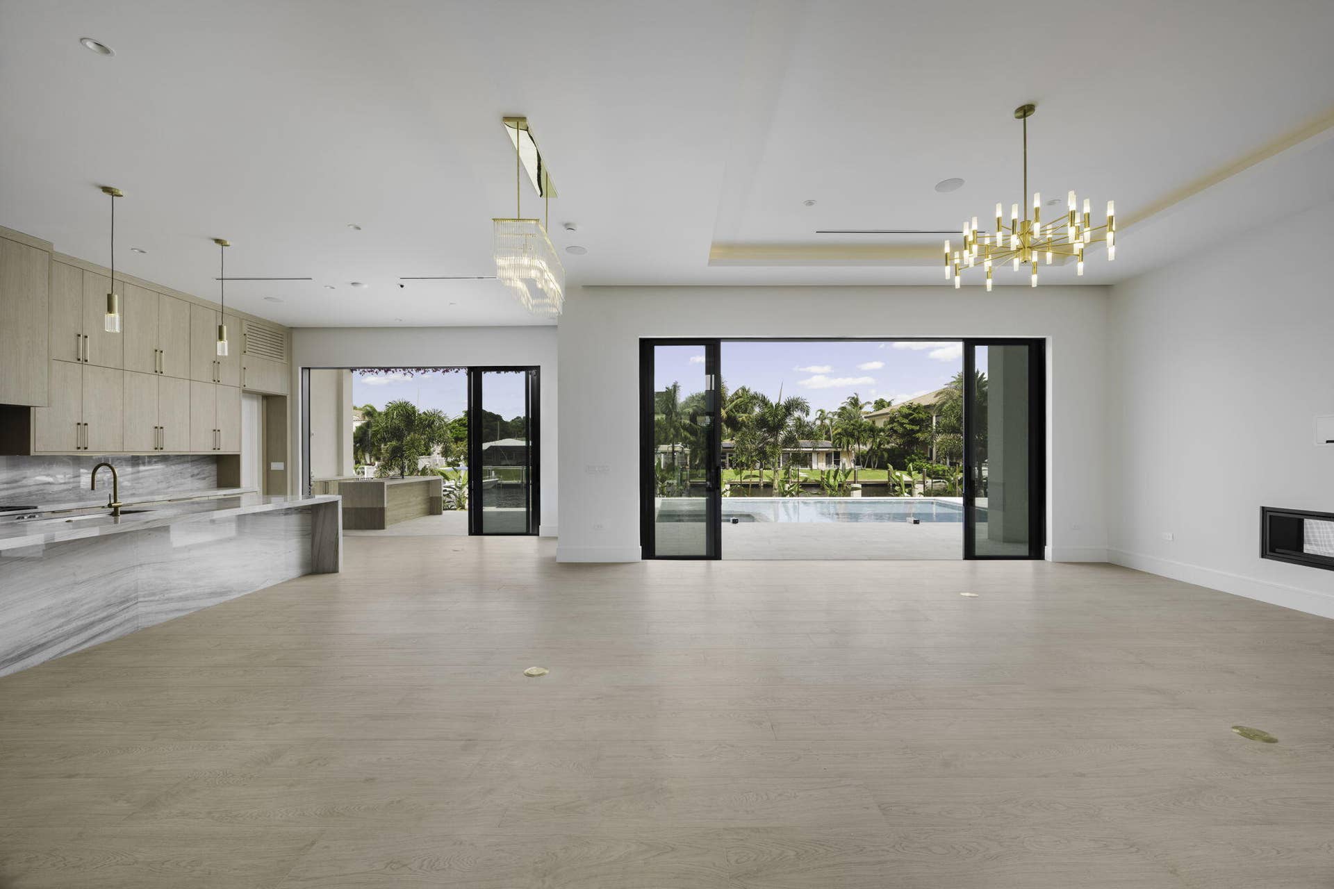 2921 NE 23RD Street, Pompano Beach, FL 33062 foyer looking at living dining outdoors