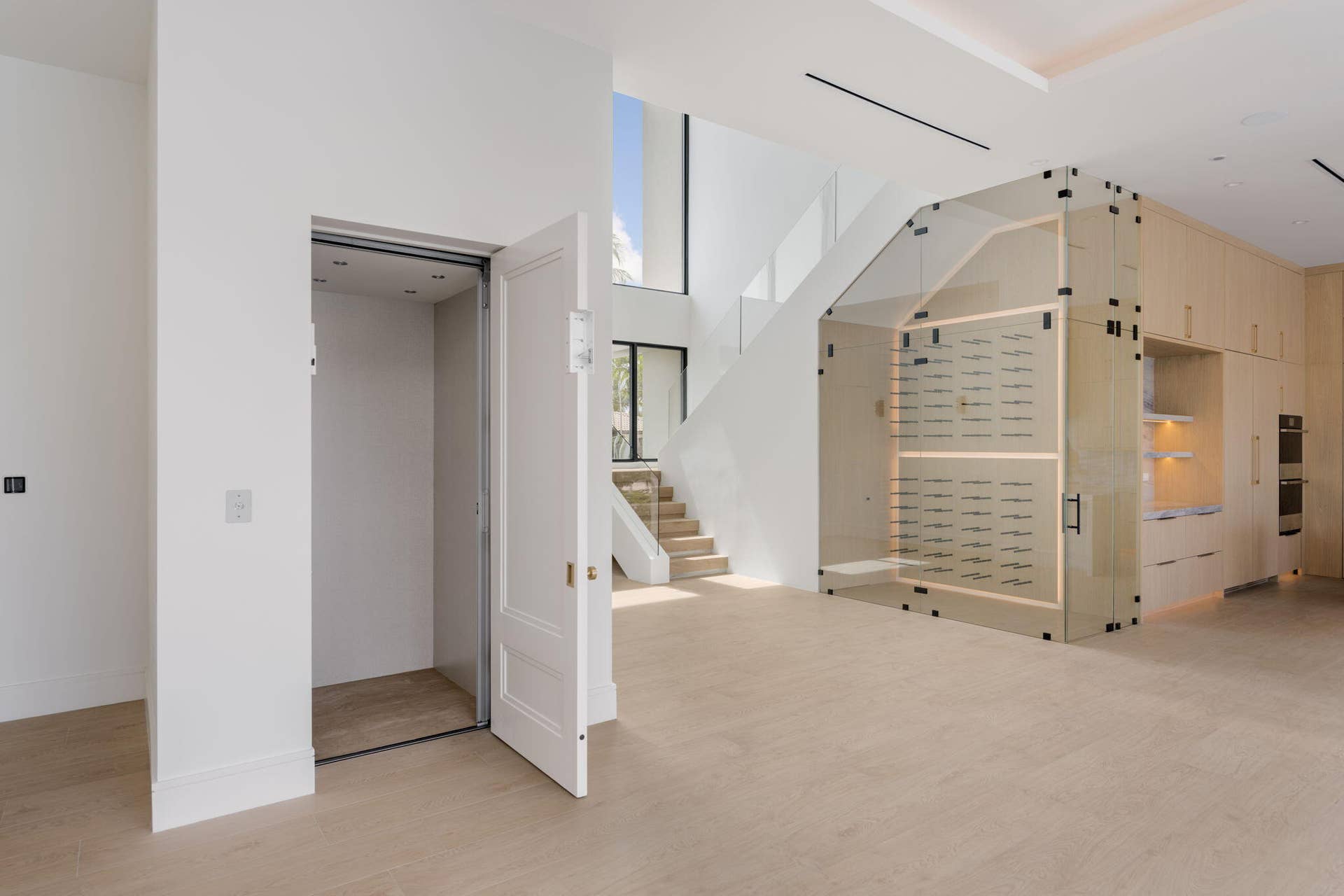 2921 NE 23RD Street, Pompano Beach, FL 33062 elevator. same porcelain tile ran onto elevator floor