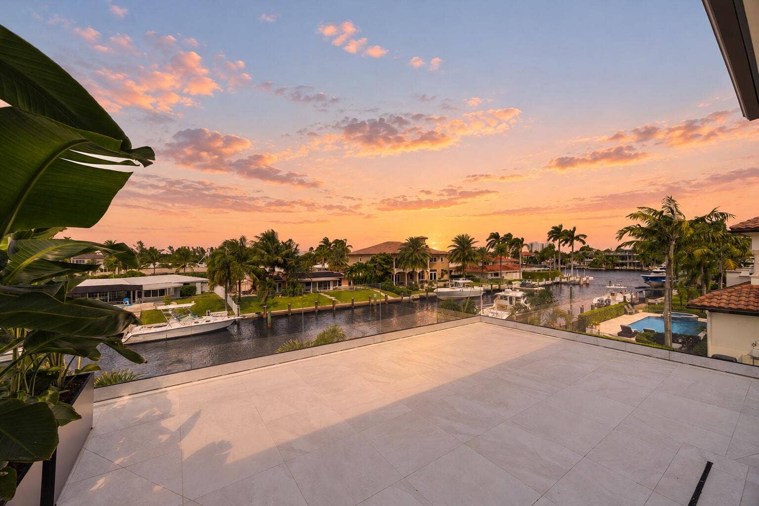 2921 NE 23RD Street, Pompano Beach, FL 33062 Primary Giant Private Balcony with impact glass railing and views of the intracoastal