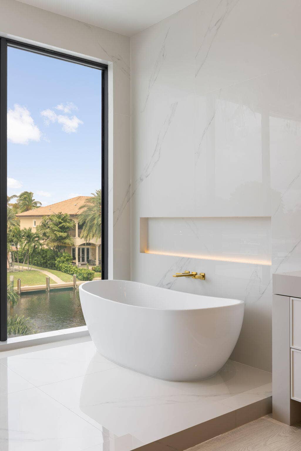 2921 NE 23RD Street, Pompano Beach, FL 33062 Primary Bath Freestanding tub niche w/ uplighting - 2nd floor