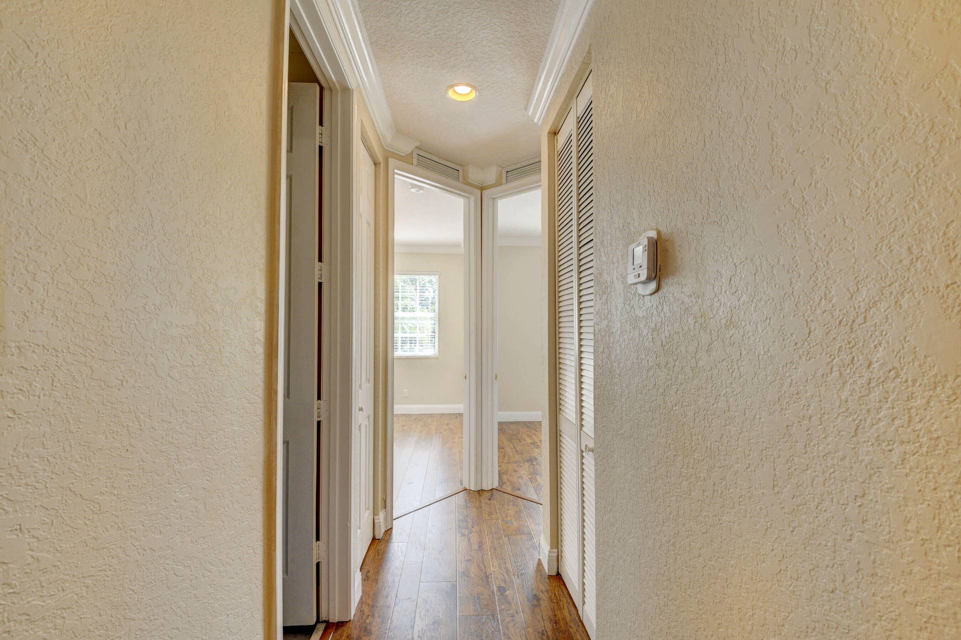 4353 Legacy Court, Delray Beach, FL 33445 Interior hallway with doors.