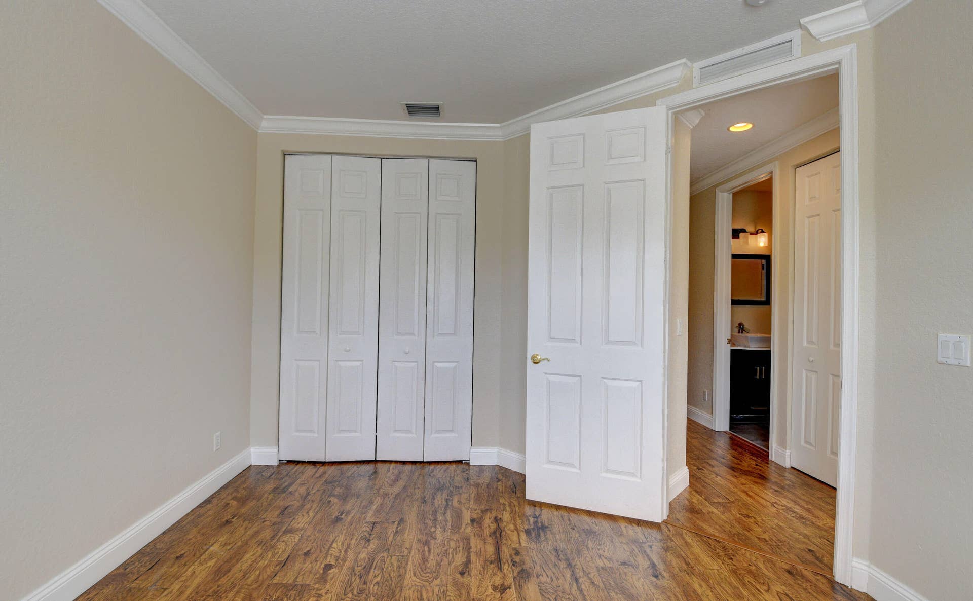 4353 Legacy Court, Delray Beach, FL 33445 Bedroom with double-door closet and entry.