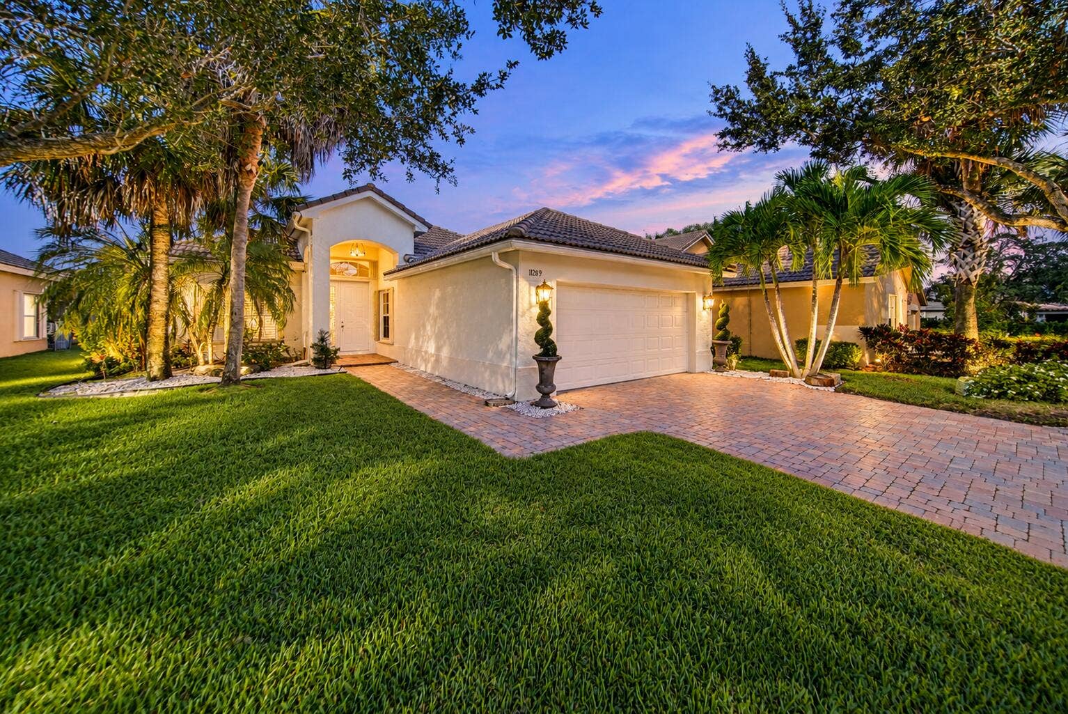 11289 NW 65TH Manor, Parkland, FL 33076 Twilight Mediterranean Home with Tropica