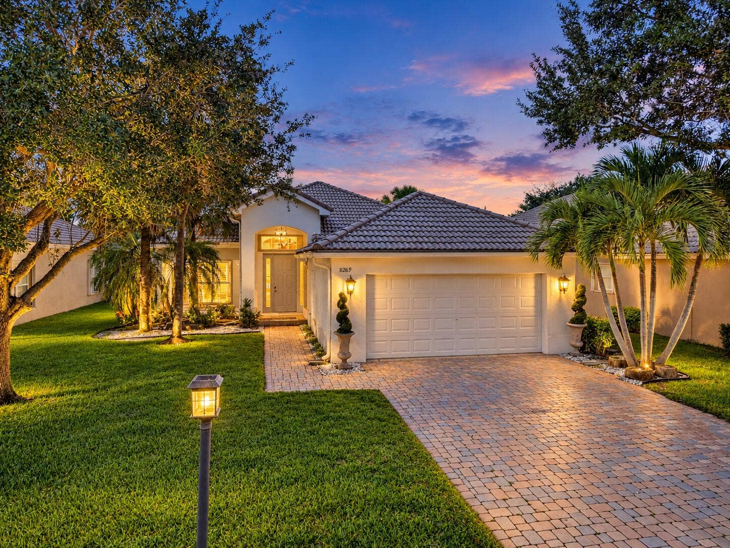 11289 NW 65TH Manor, Parkland, FL 33076 Twilight Mediterranean Home at 11289