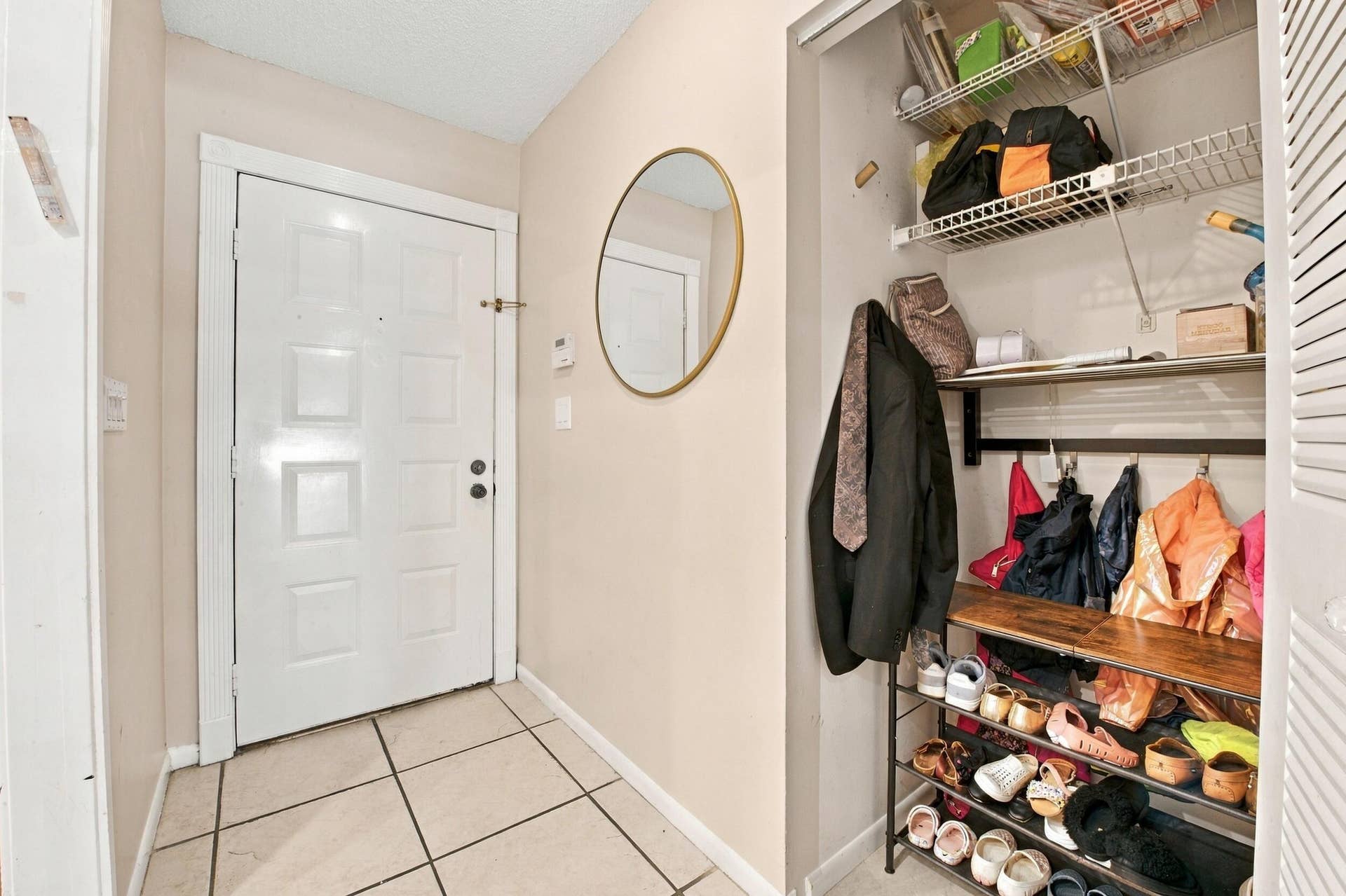6911 Consolata Street, Boca Raton, FL 33433 Foyer + coat closet
