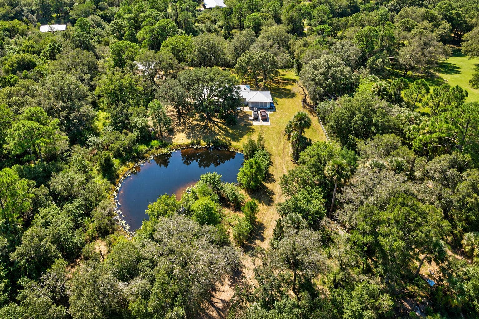 Aerial of House and Pond