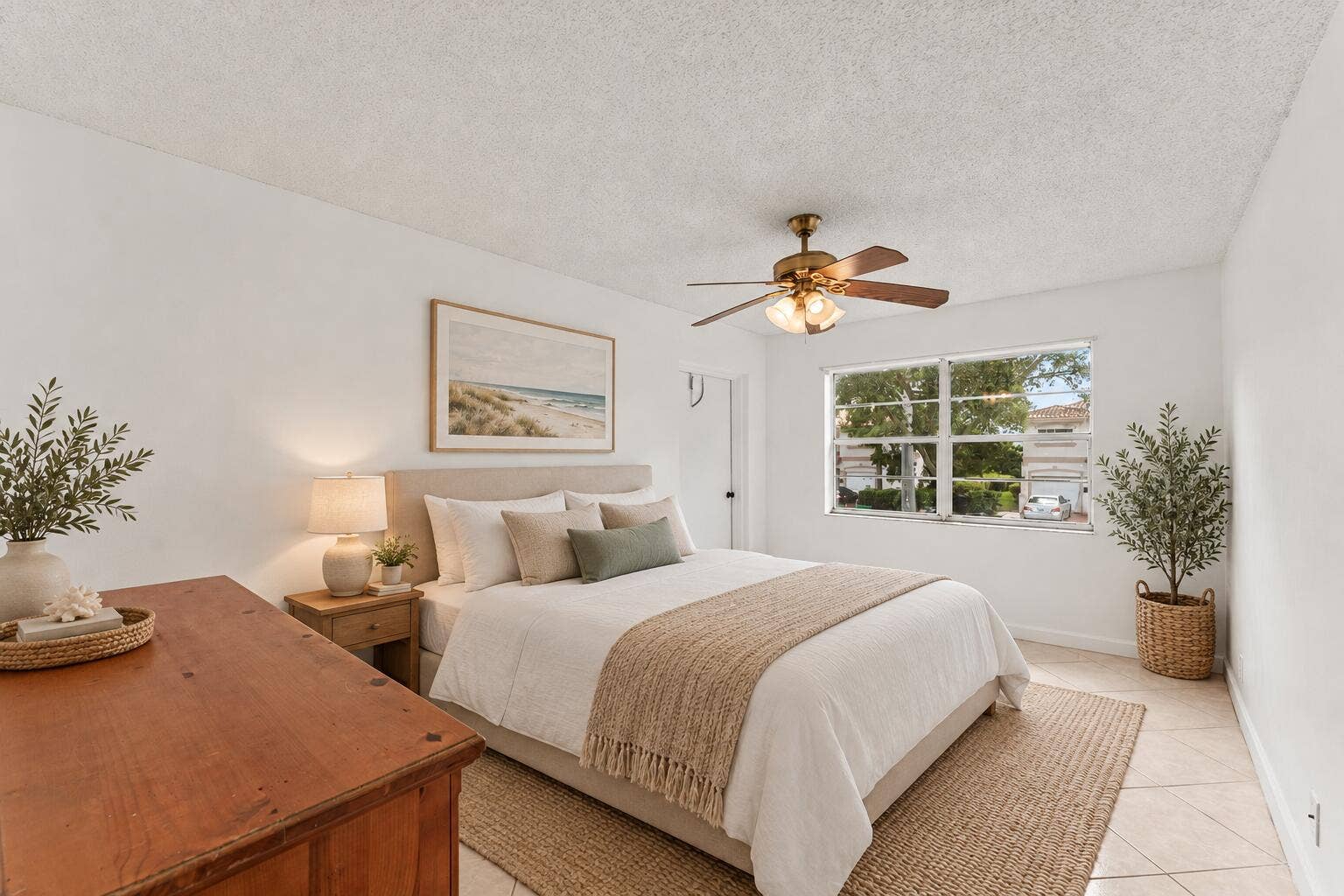 Warm Coastal Bedroom Staging