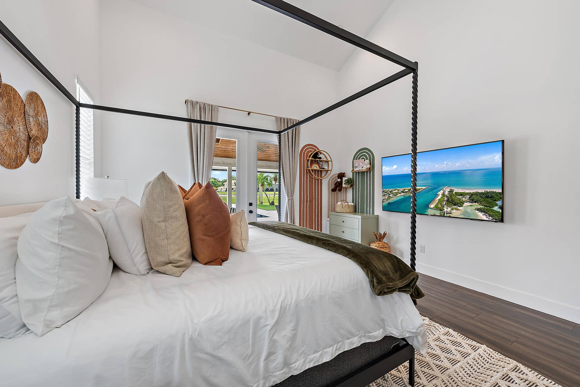 6204 SAND PINE Court, Jupiter, Jupiter, FL 33458 Vaulted white ceilings, wood-finish flooring, and white walls