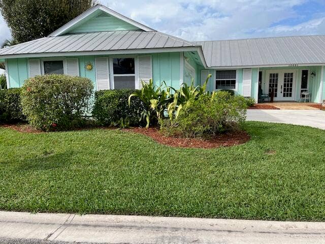 10691 SE JUPITER NARROWS Drive, Hobe Sound, FL 33455 Front 2