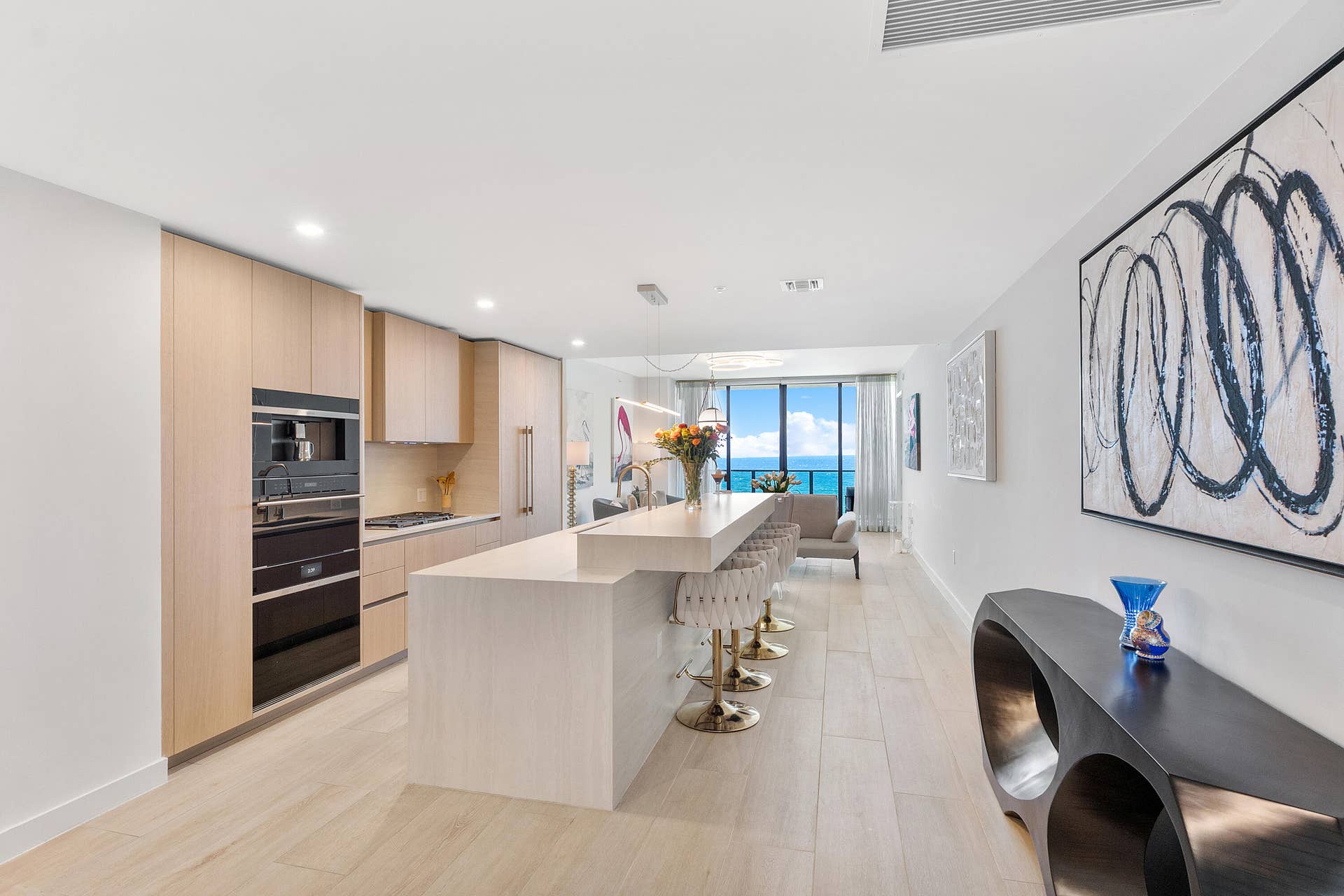 Experience seamless modern luxury with an open-concept design, exquisite kitchen finishes, and spectacular ocean views that enhance the residences sophisticated coastal atmosphere.
