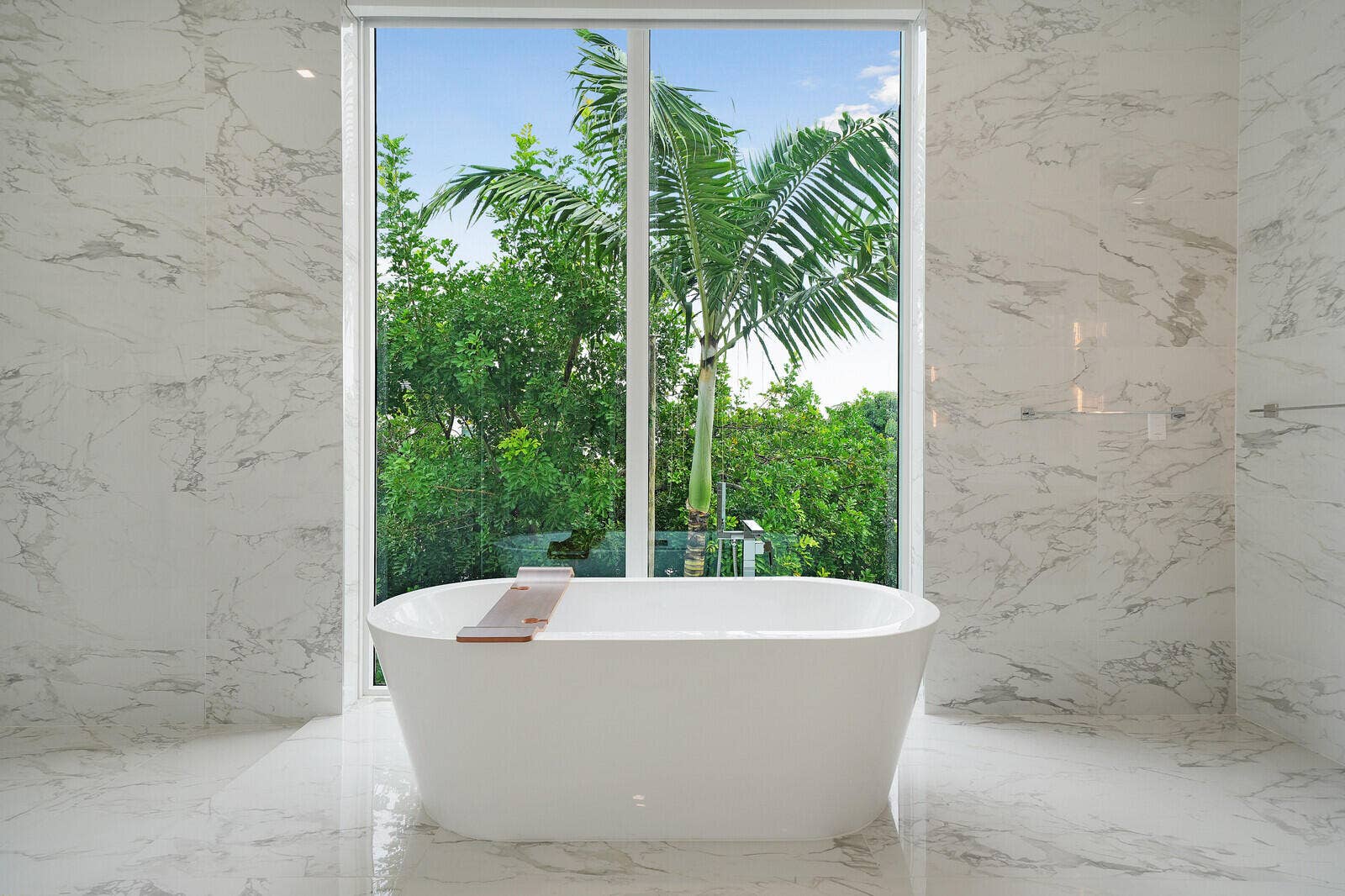 Soaking Tub with Lush Garden Views