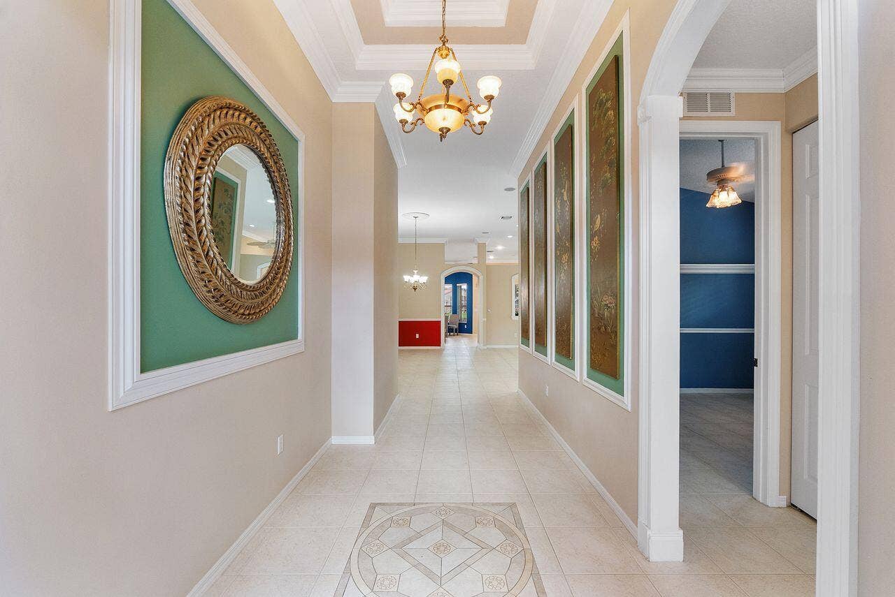 Open front entry with beautiful custom tiled design