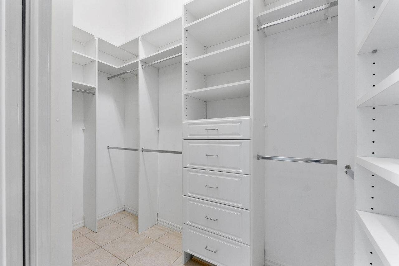 Built ins in closet in primary bedroom