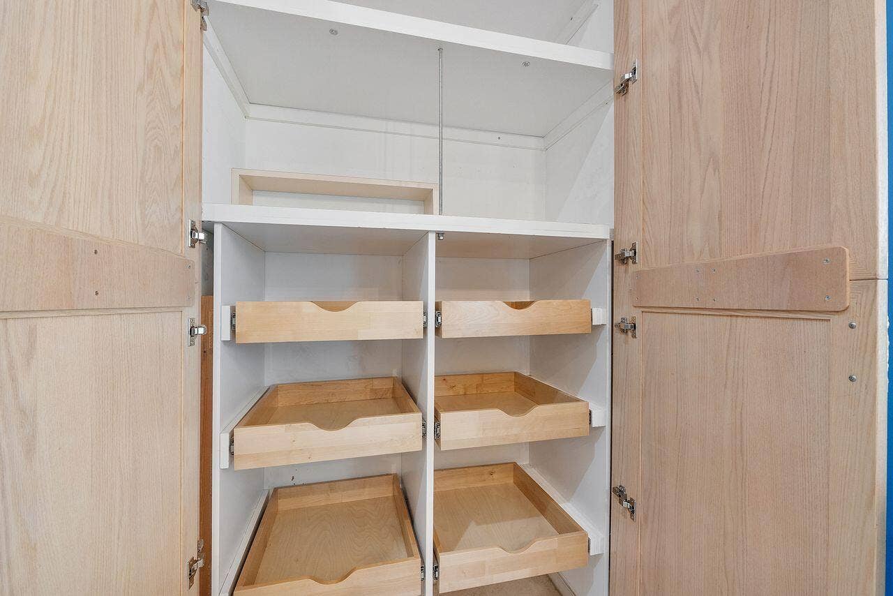 Large pantry with pull out drawers