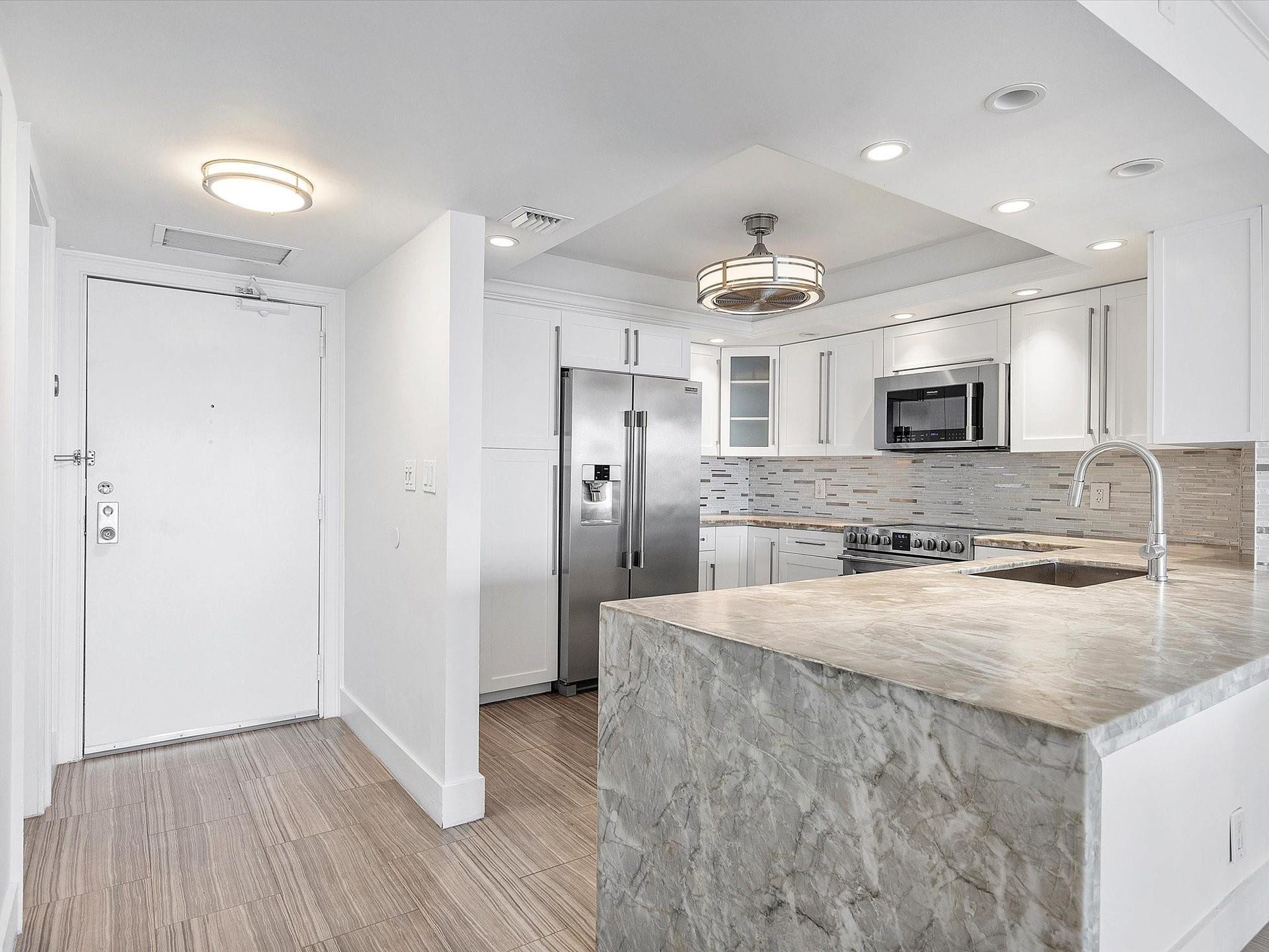 View of entrance door to kitchen.