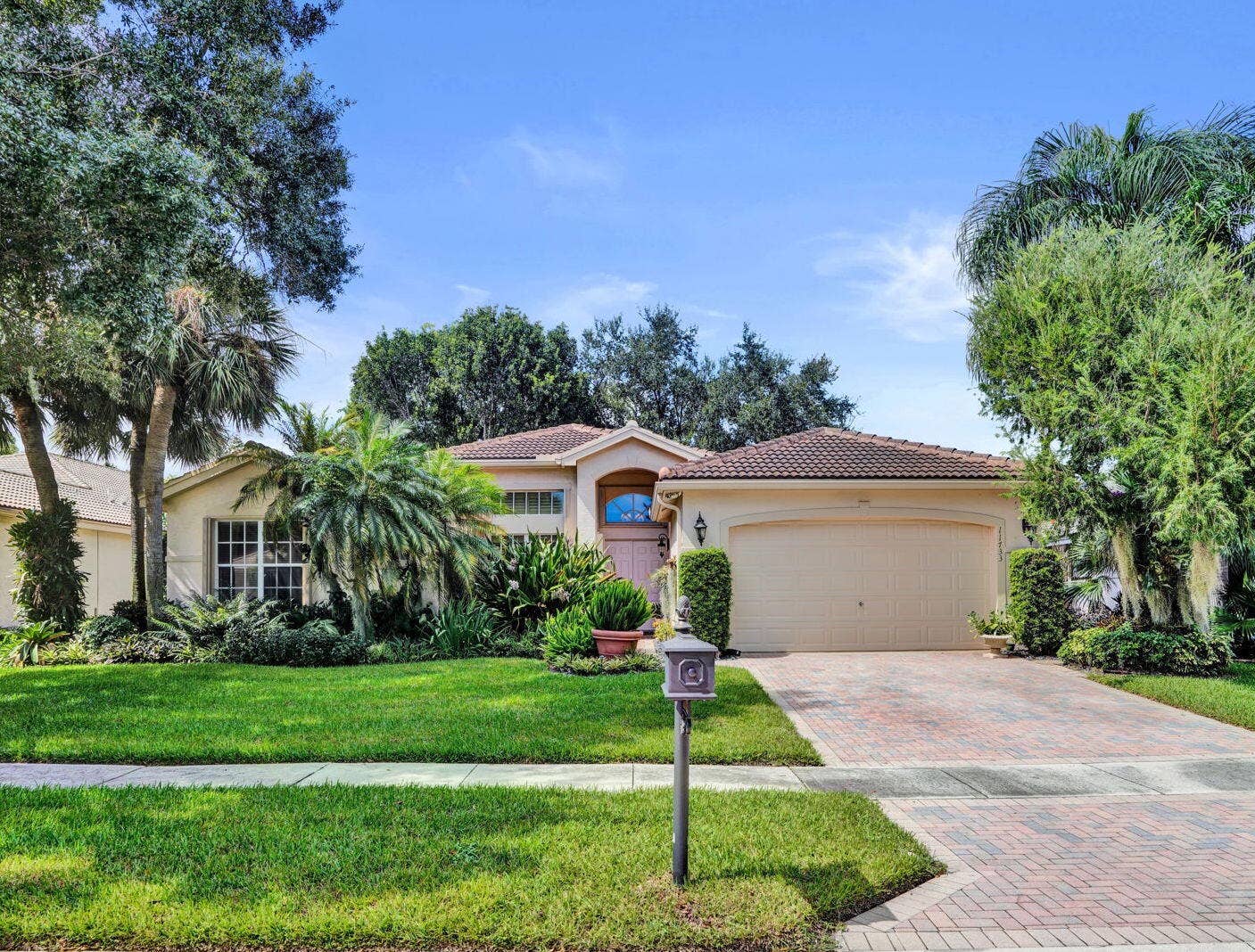 11733 CARDENAS Boulevard, Boynton Beach, FL 33437 Beautiful Exterior with Lush Landscaping