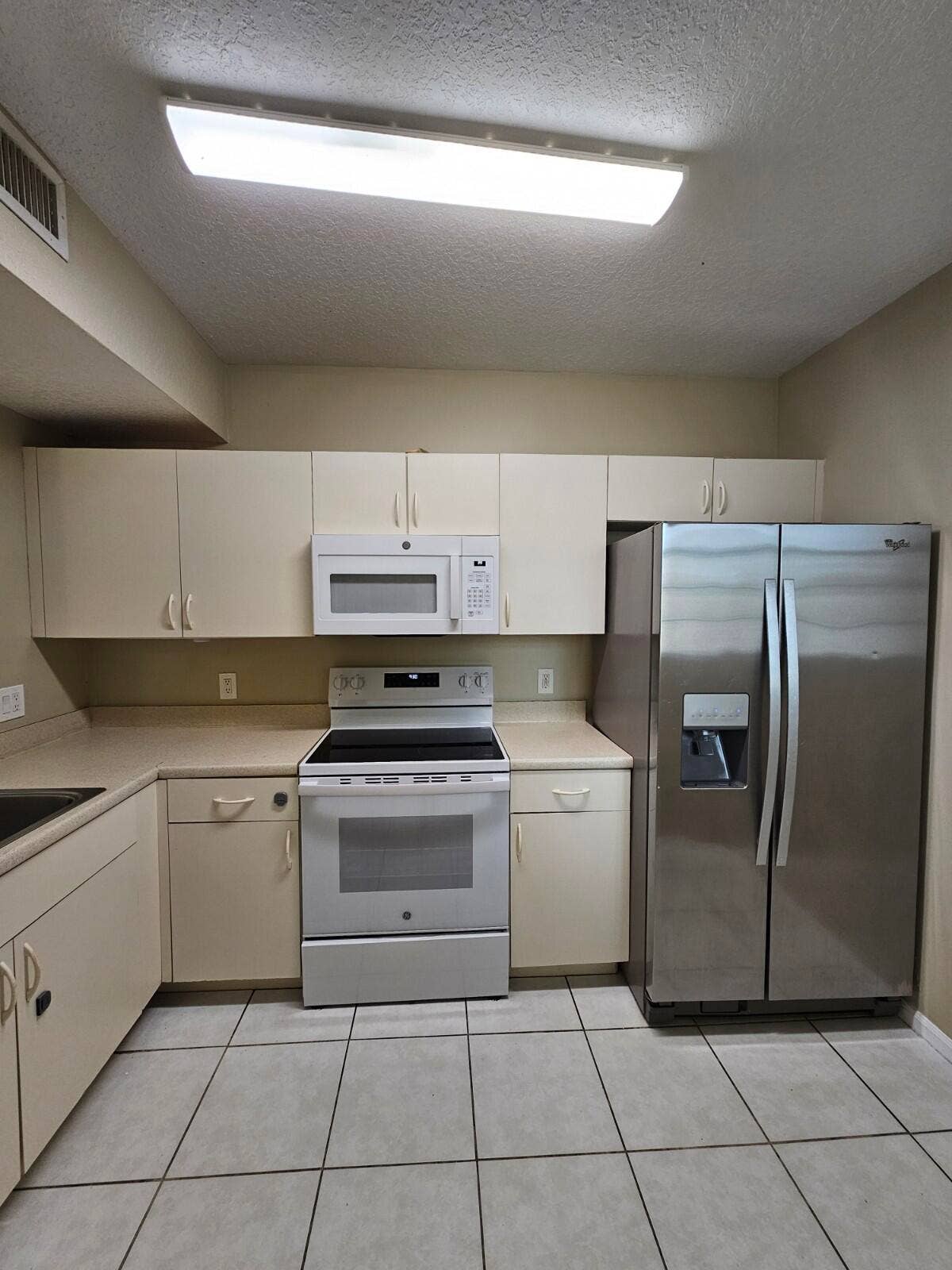 1063 GOLDEN LAKES Boulevard, #311, West Palm Beach, FL 33411 20260319_145305_copy_1200x1600