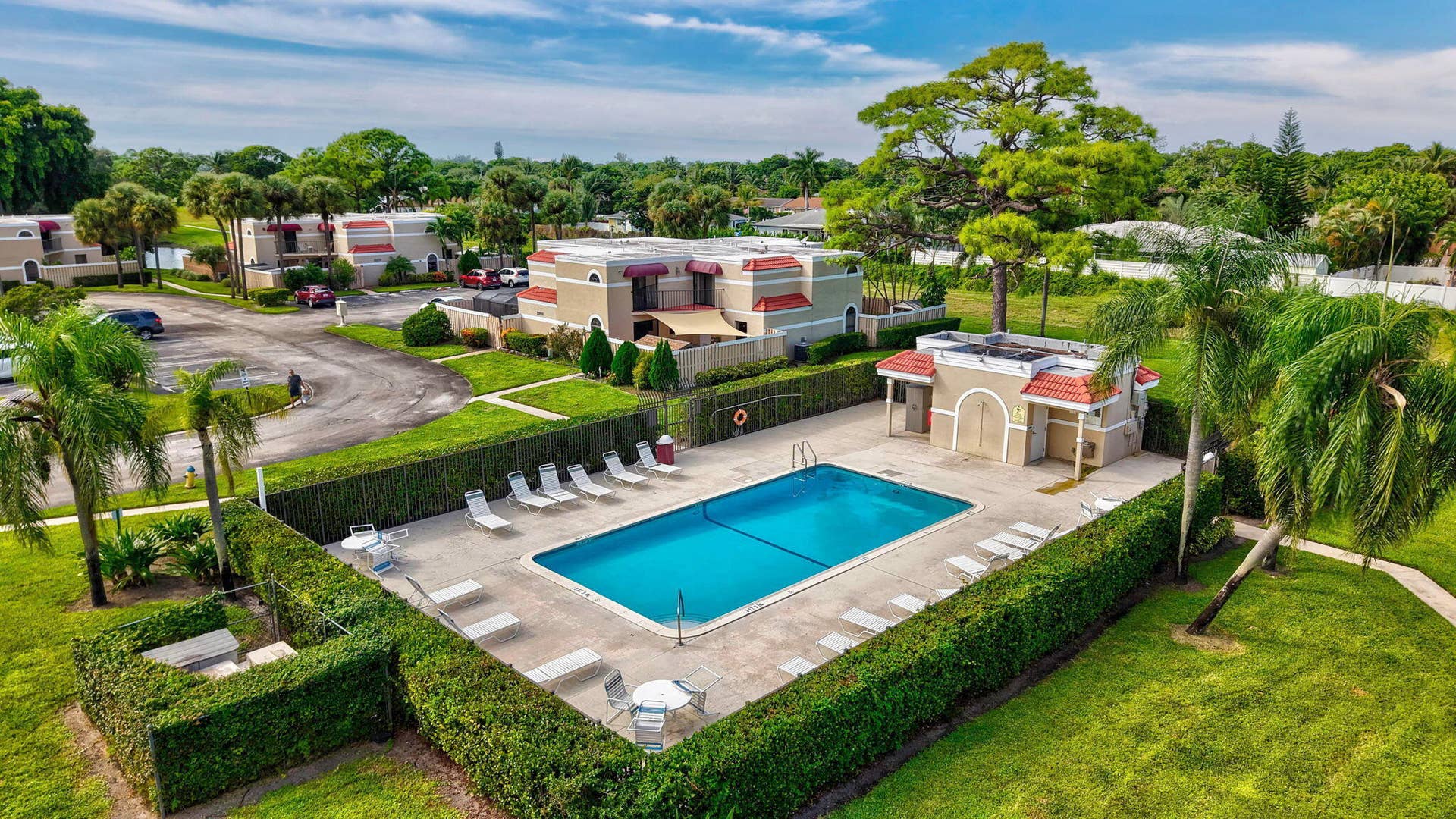 Rectangular swimming pool with surrounding patio