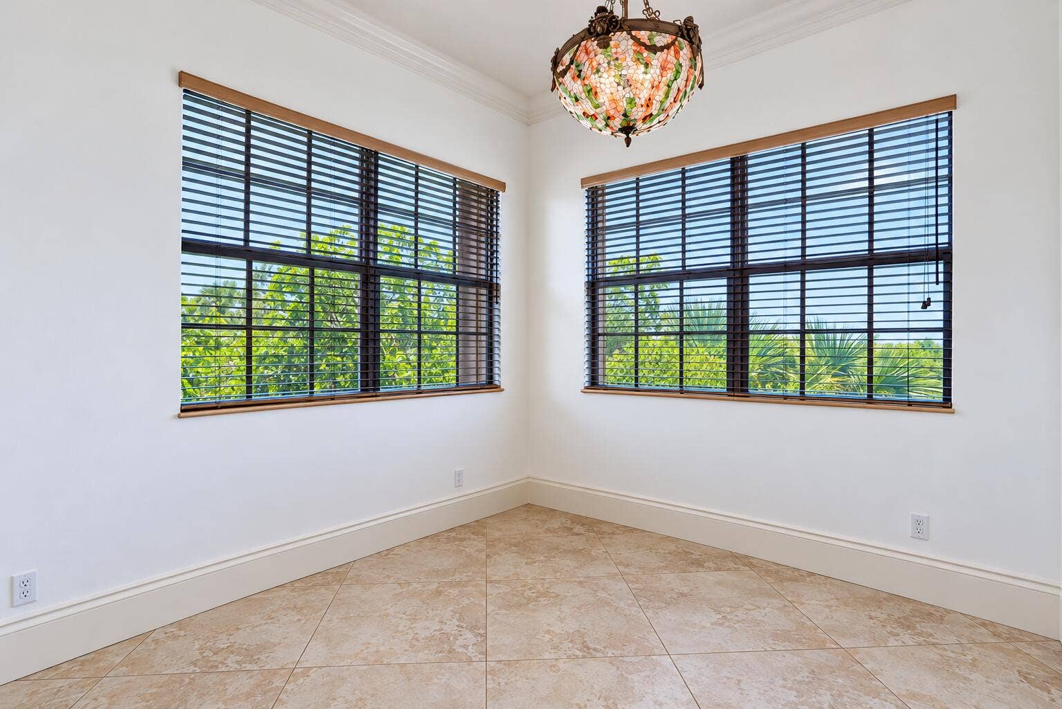 Bright Empty Room with Tropical Windows