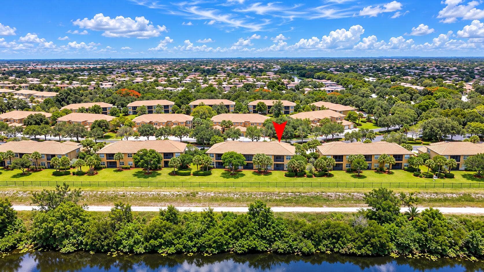 Aerial Condo Community by the Waterway